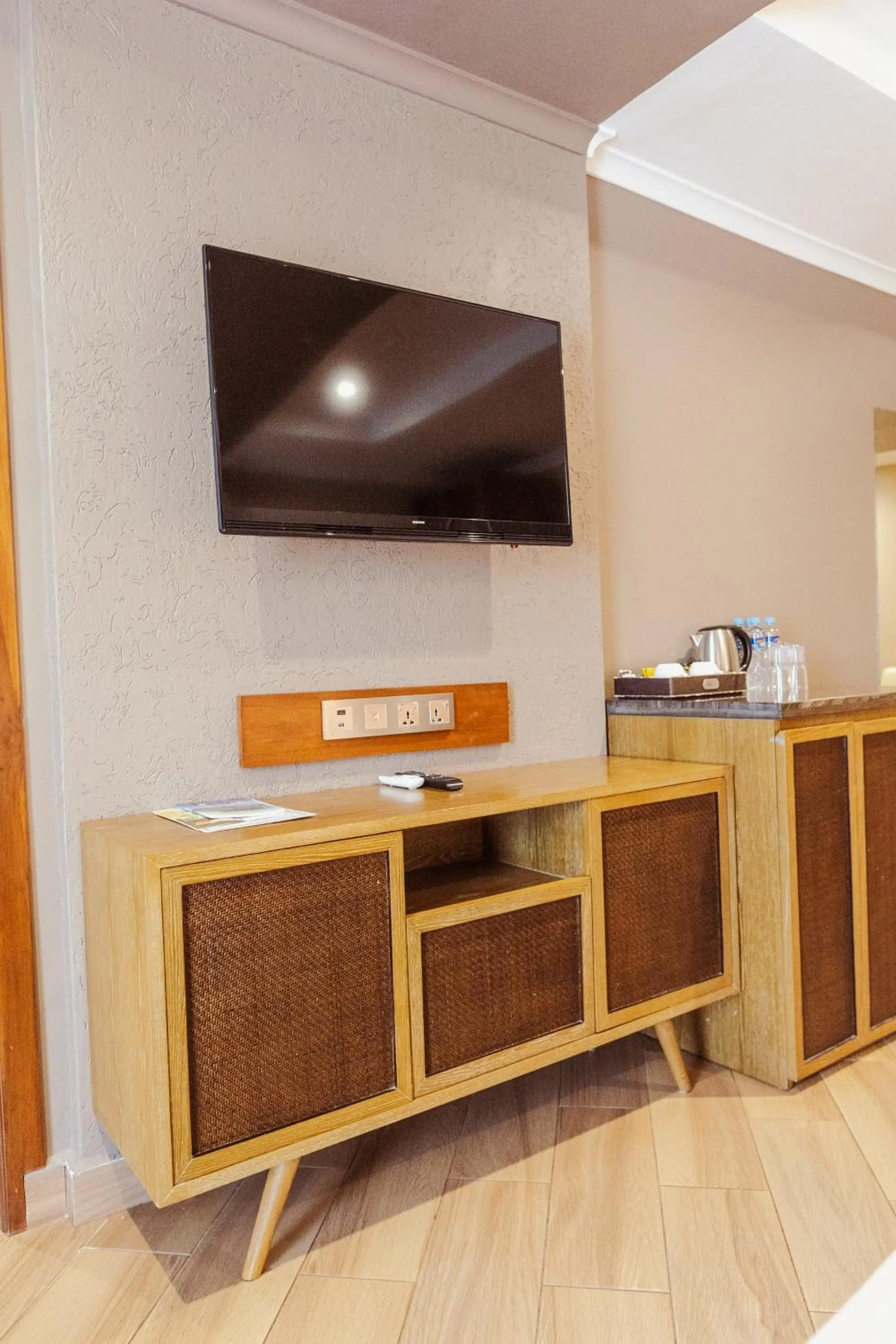 TV and multimedia in Tanga Beach Resort & Spa