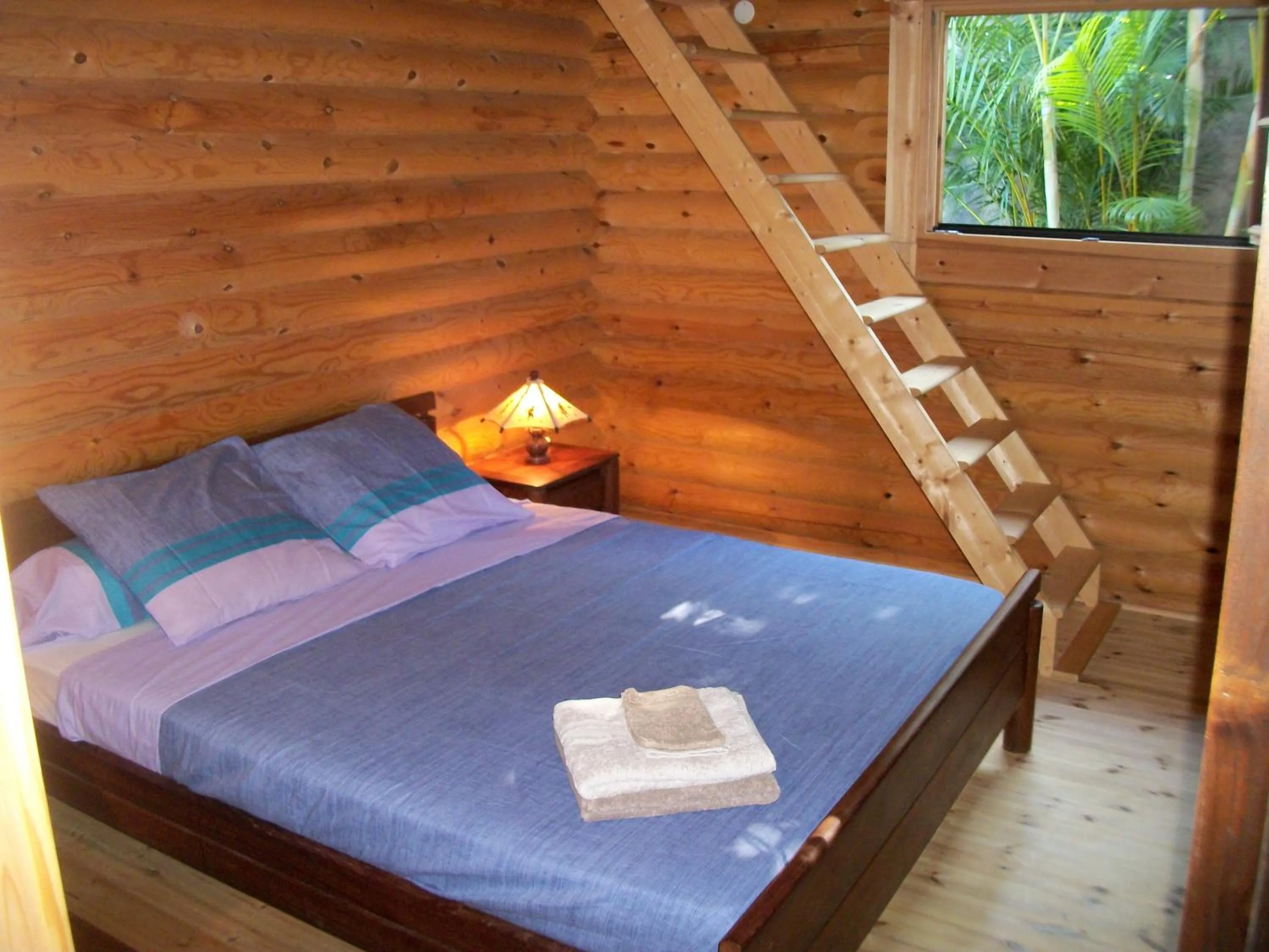 Bed in Le Chalet de la Fontaine Saint Leu