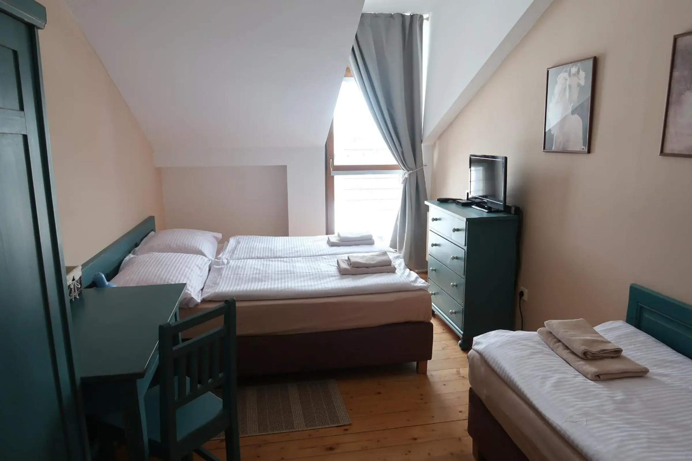 Triple Room - single occupancy in Penzion Jízdárna Suchá Triple Room - single occupancy in Penzion Jízdárna Suchá