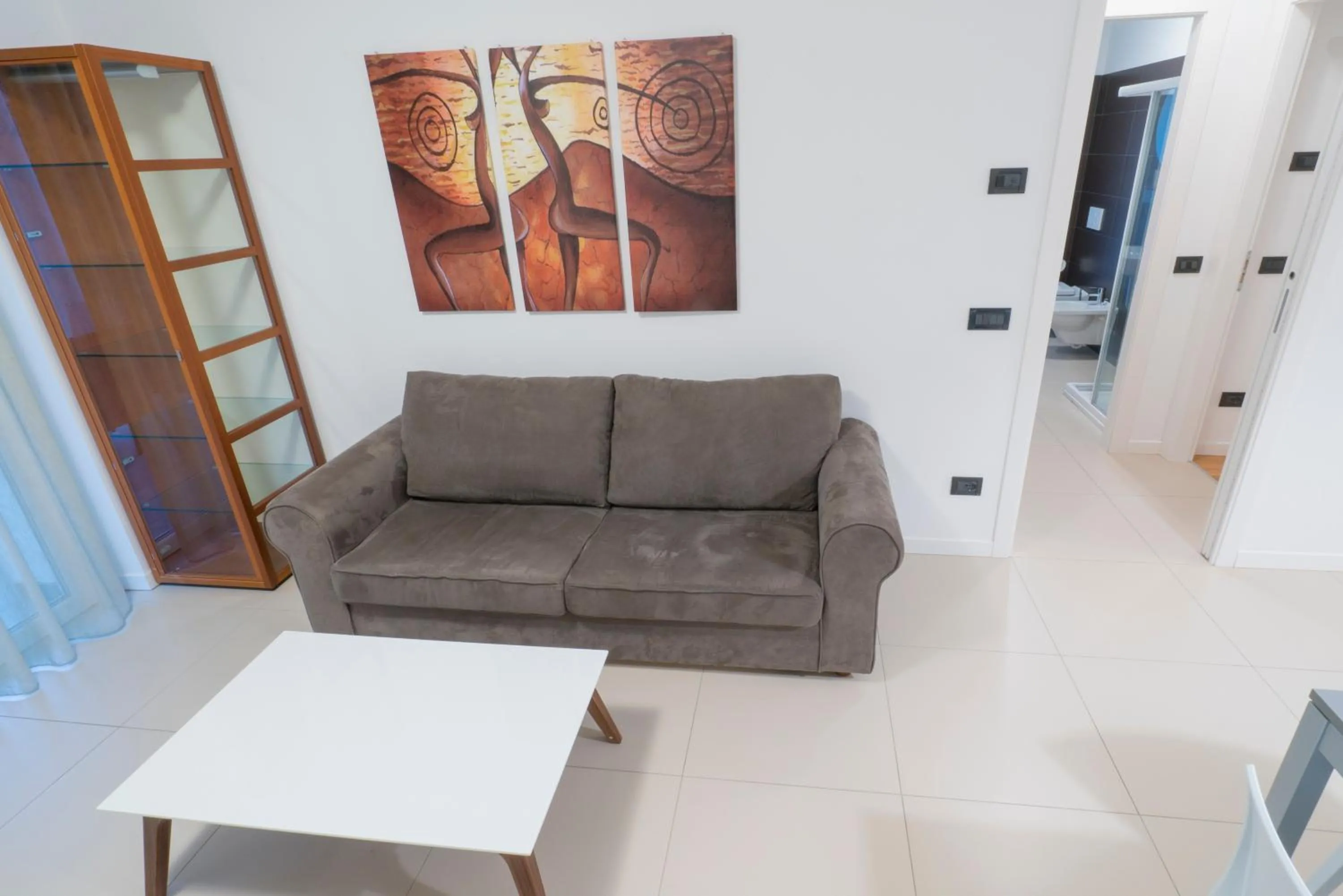 Living room in GARDA LIVING APARTMENTS Riva del Garda