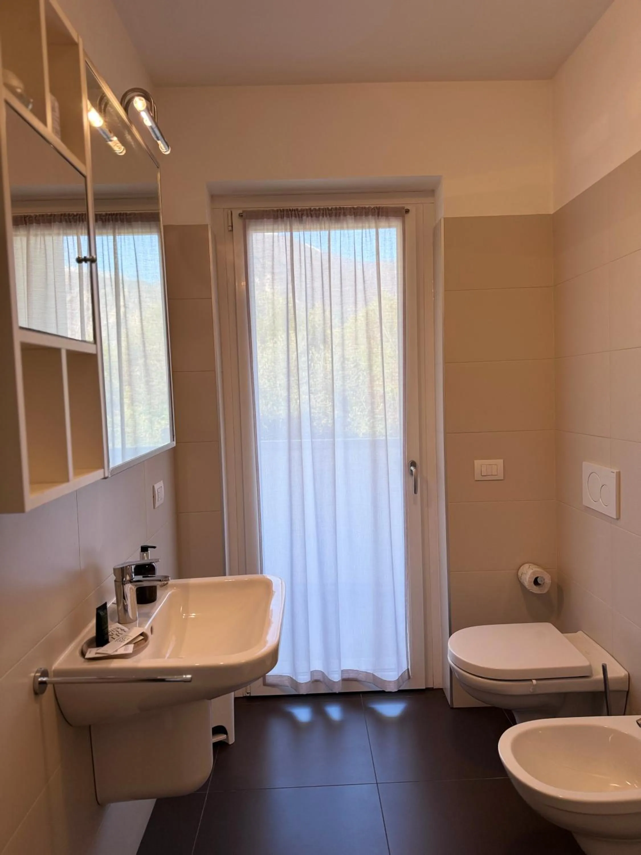 Bathroom in GARDA LIVING APARTMENTS Riva del Garda