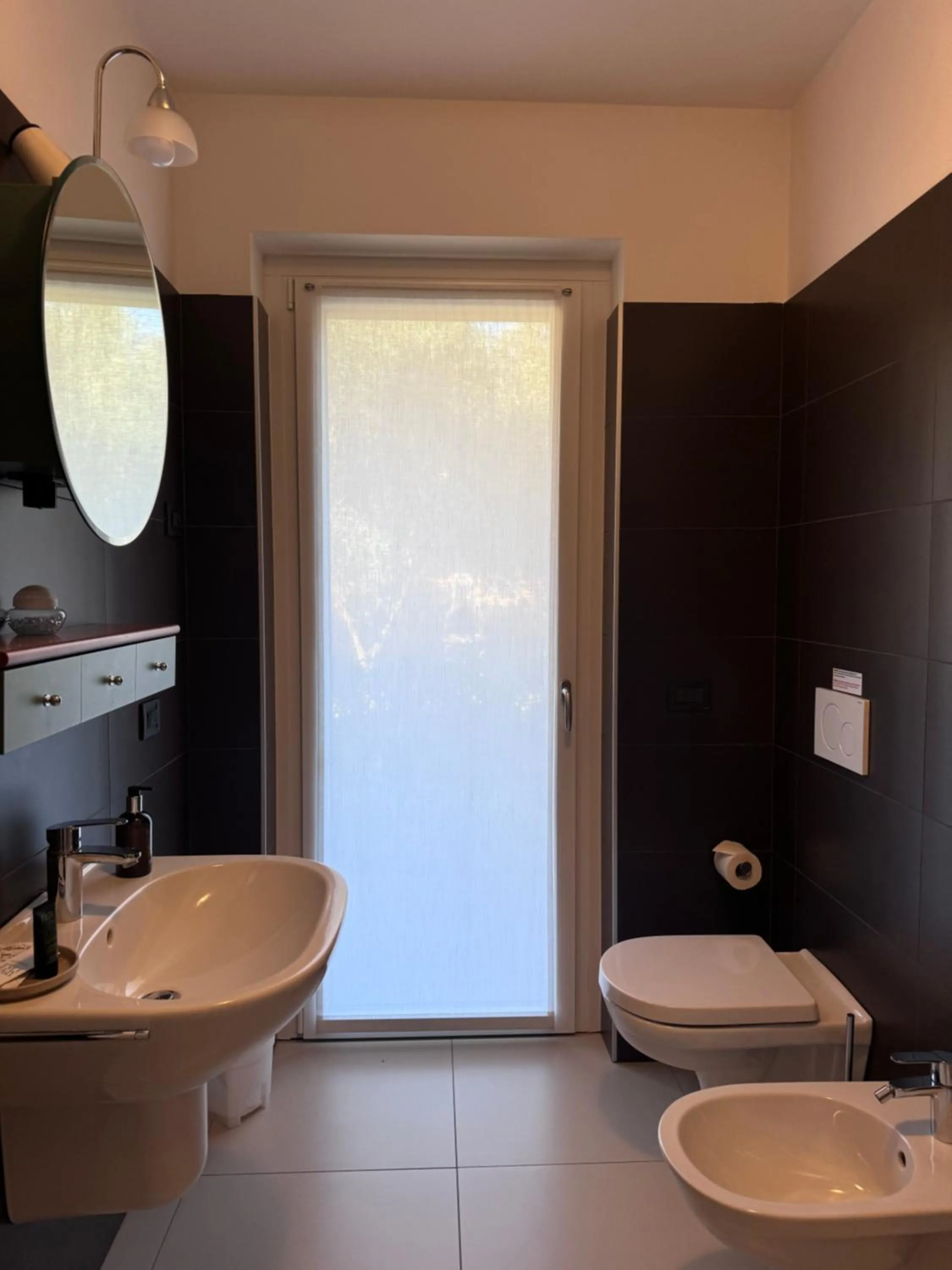 Shower in GARDA LIVING APARTMENTS Riva del Garda