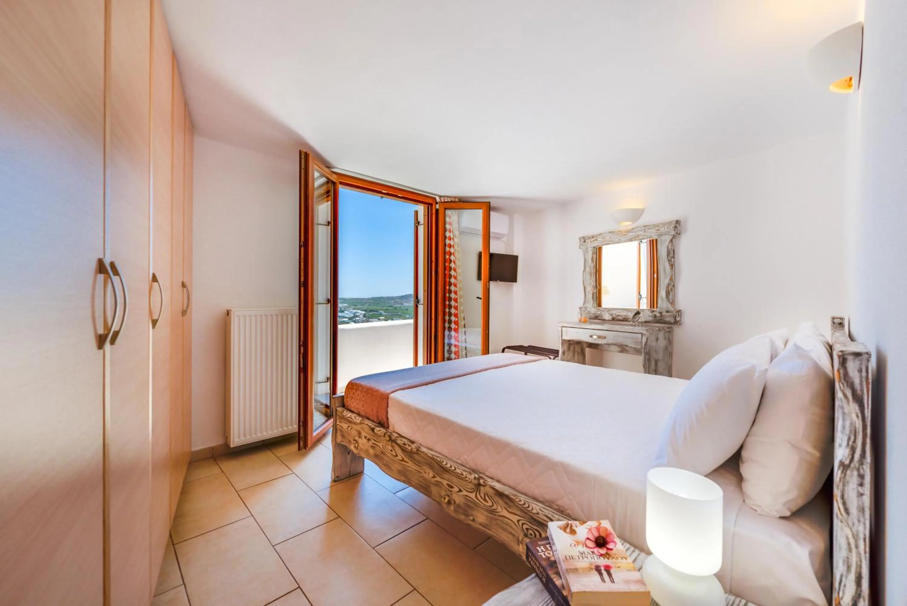 Bedroom in Akrotiri Apartments