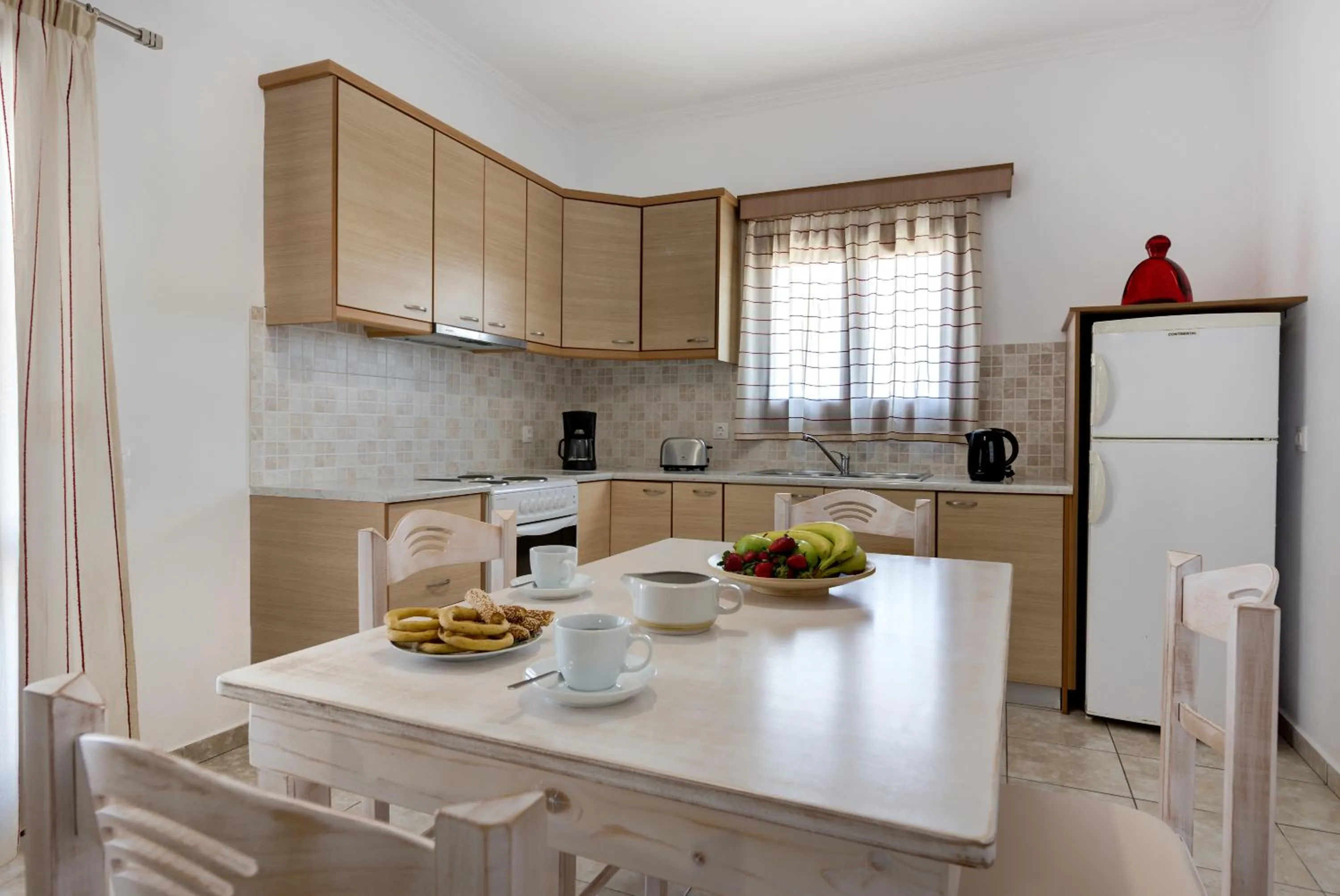 Kitchen or kitchenette in Akrotiri Apartments