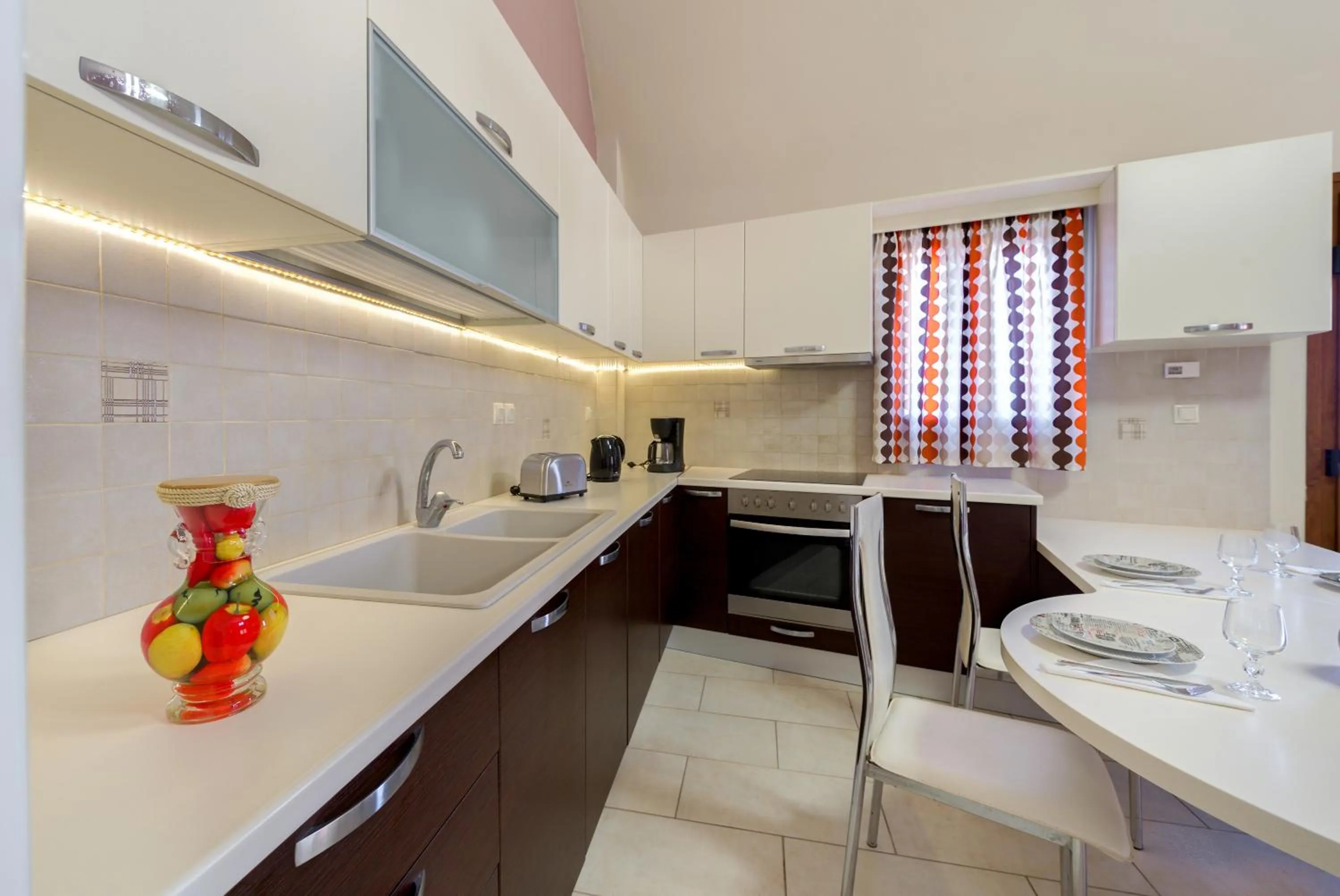 Kitchen or kitchenette in Akrotiri Apartments