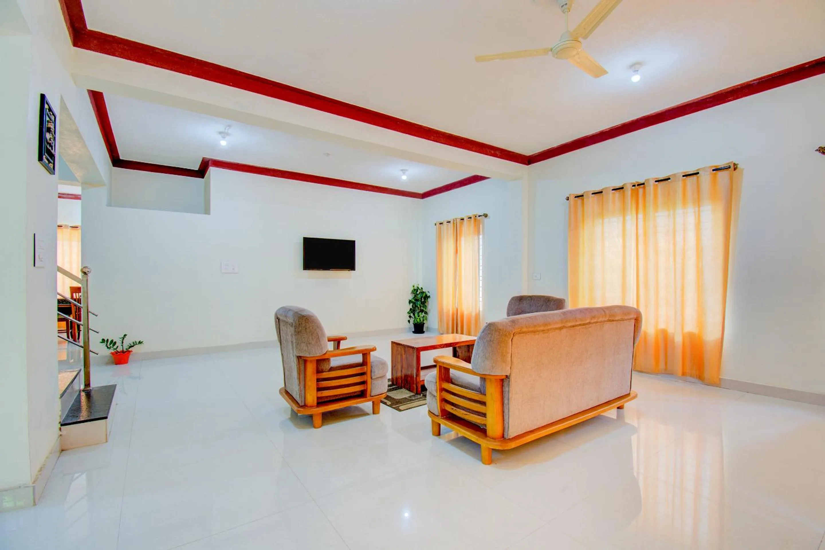 Communal lounge/ TV room in Holidayincoorg Orchid Villa