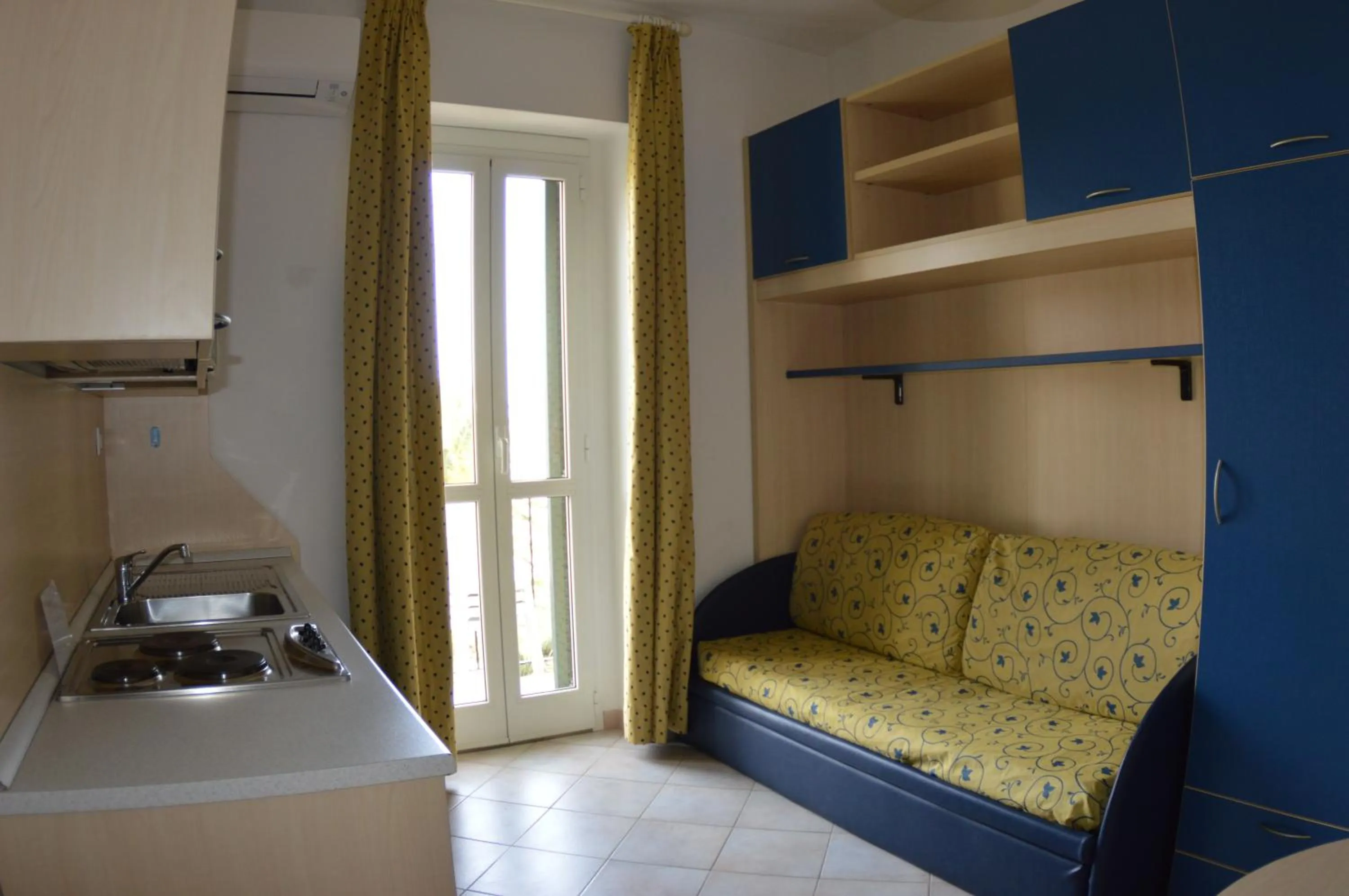 Living room, Bed in Residence Villa Miky