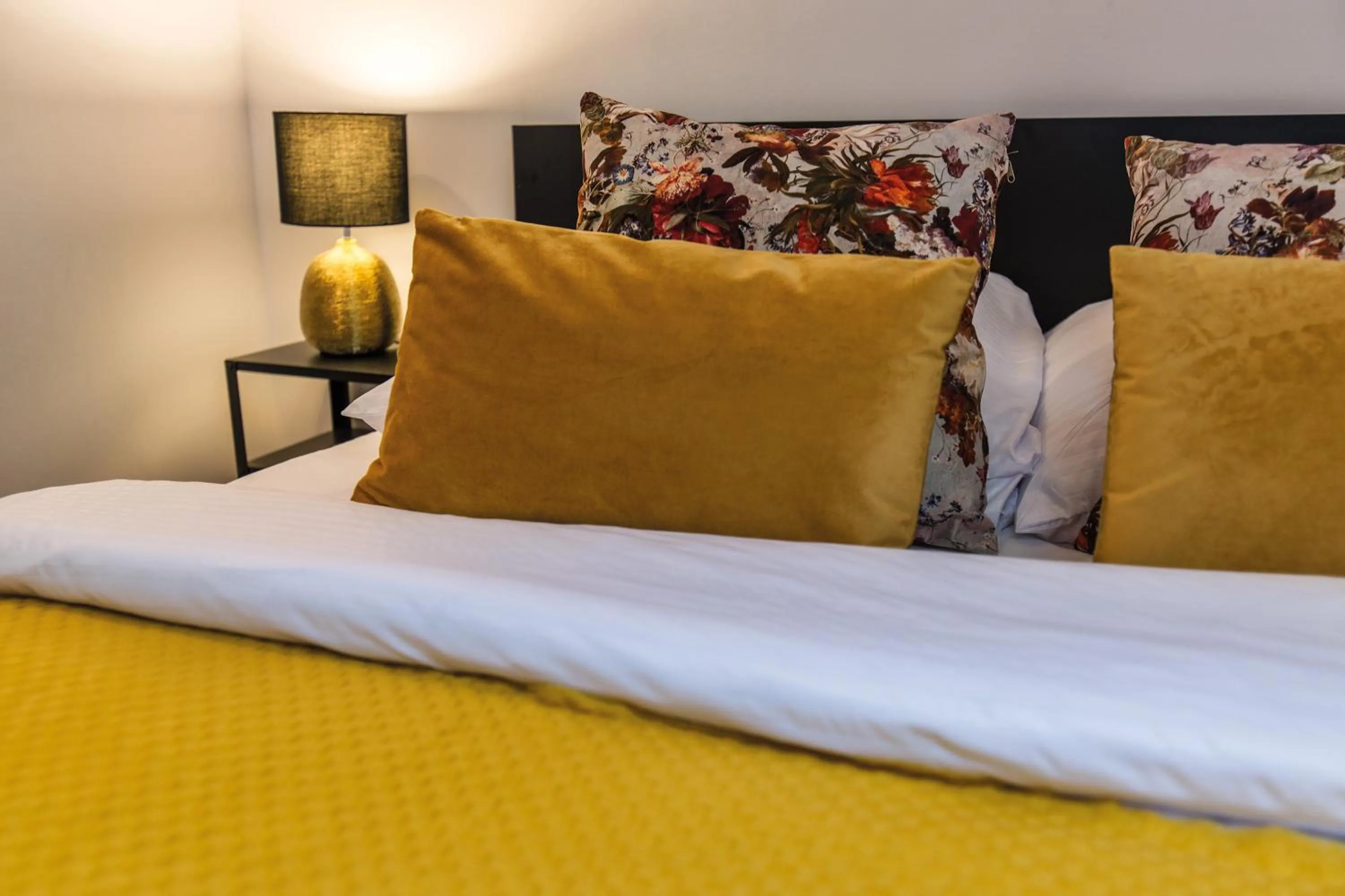 Bed in Galeria Italiana Apartments