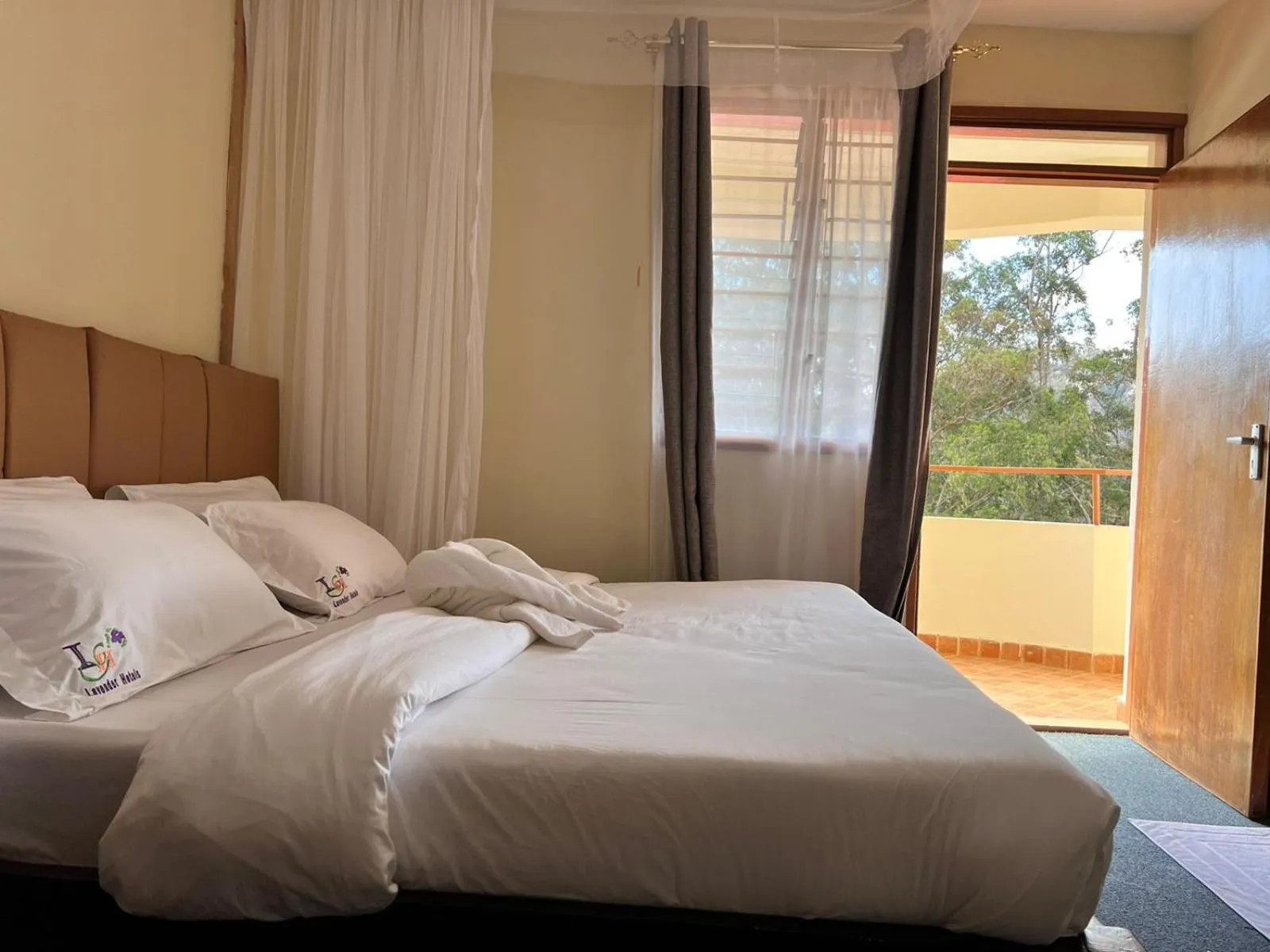 Bed in Lavender Garden Hotel