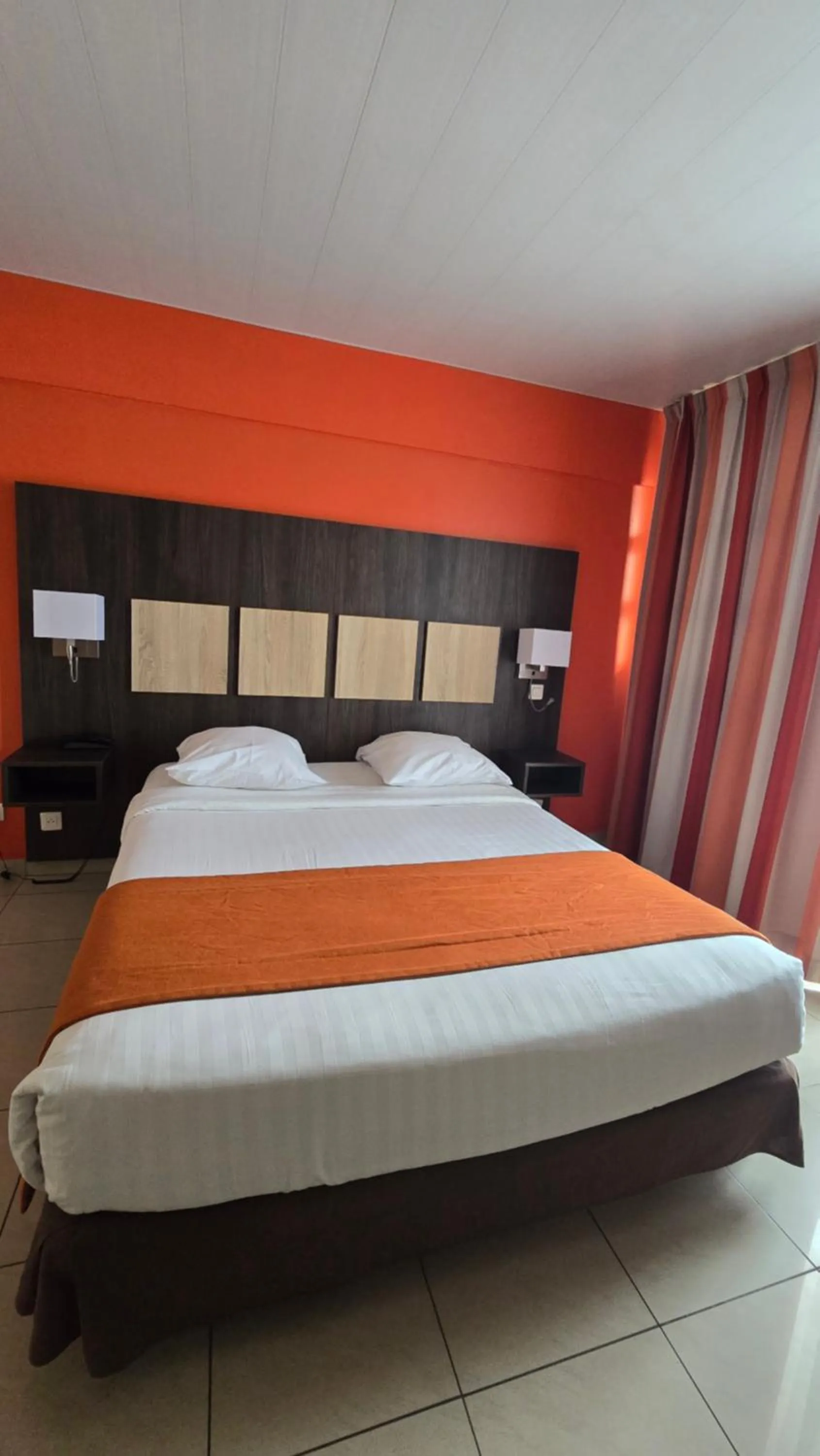 Bed in Central Hotel Cayenne