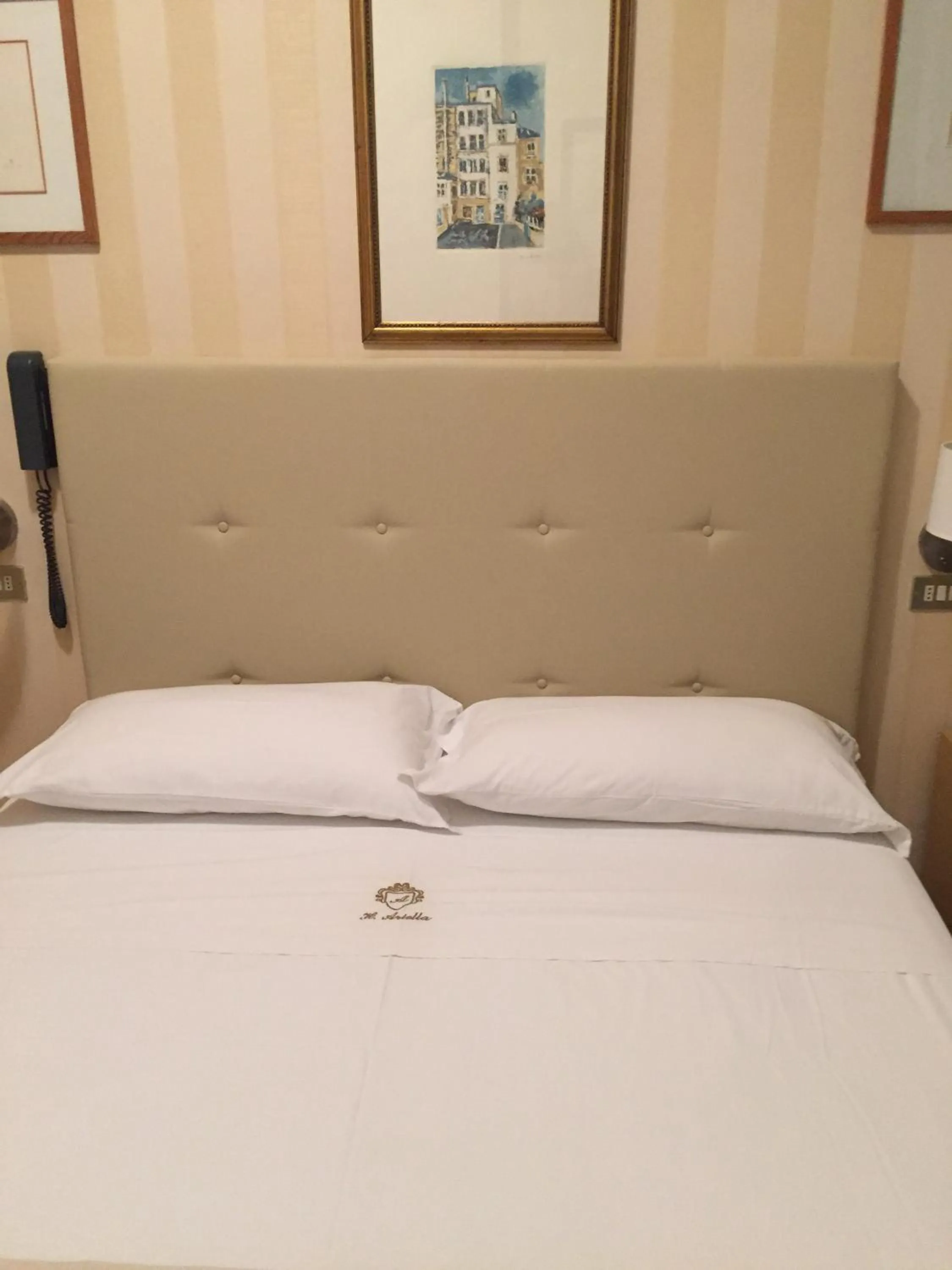 Bed in Hotel Ariella