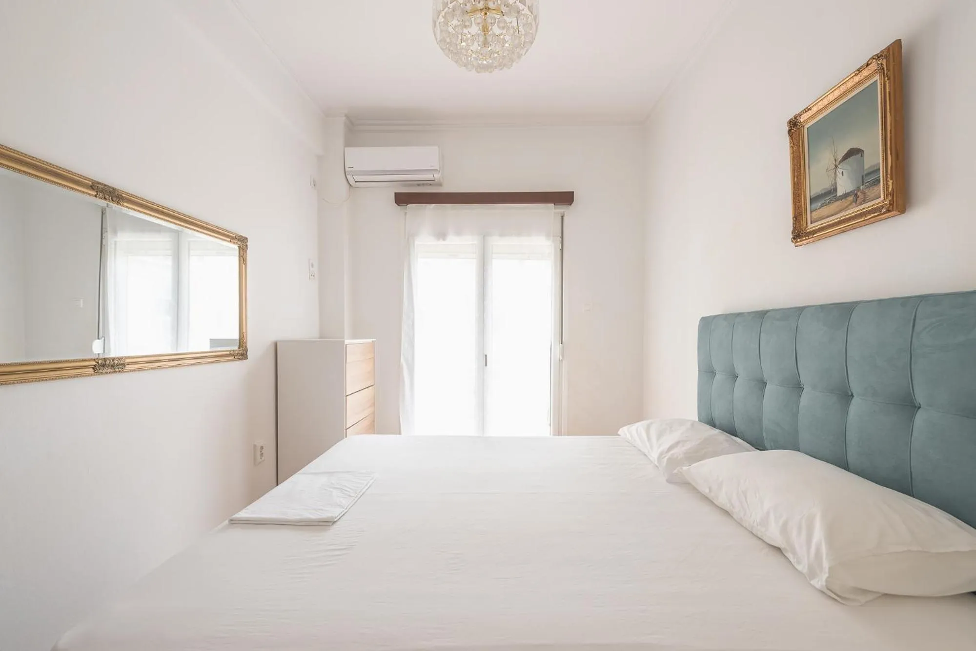 Bed in Victoria Secret Apartments