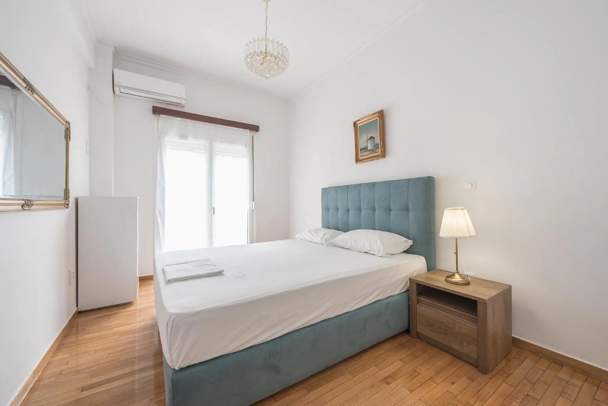 Bed in Victoria Secret Apartments