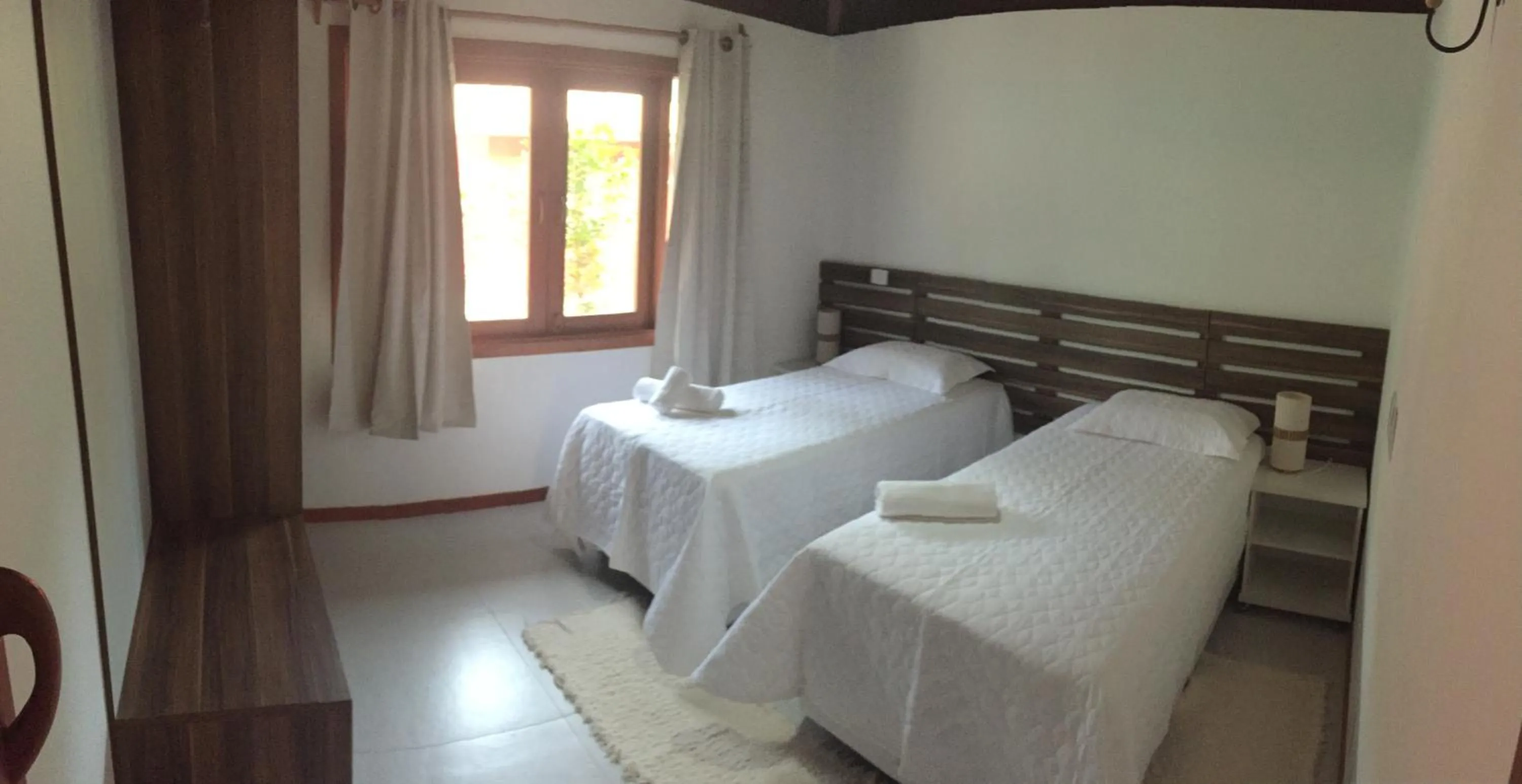 Photo of the whole room, Bed in Cores do Arraial Residence Hotel
