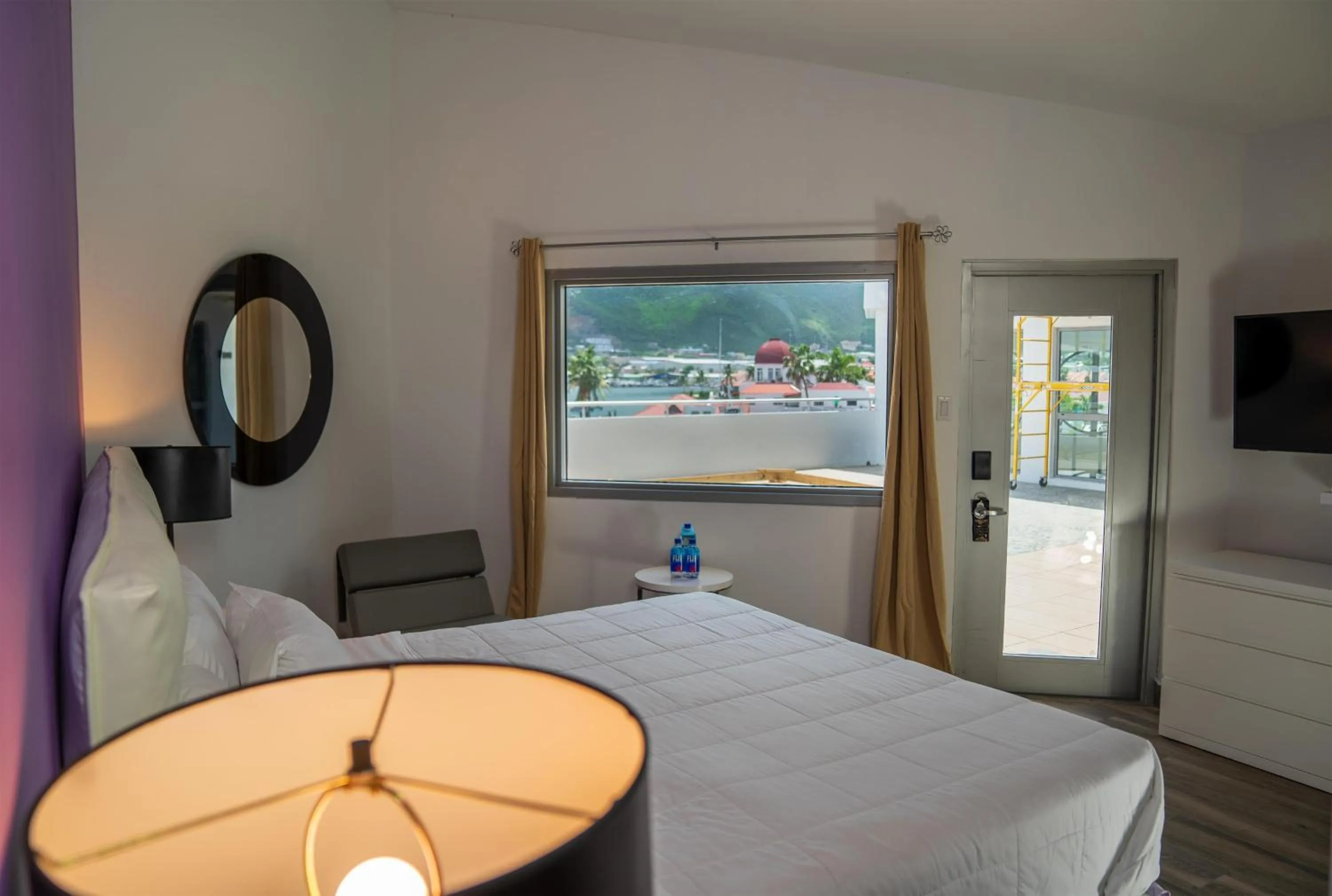 Bedroom, Bed in Commodore Suites, SureStay Collection by Best Western