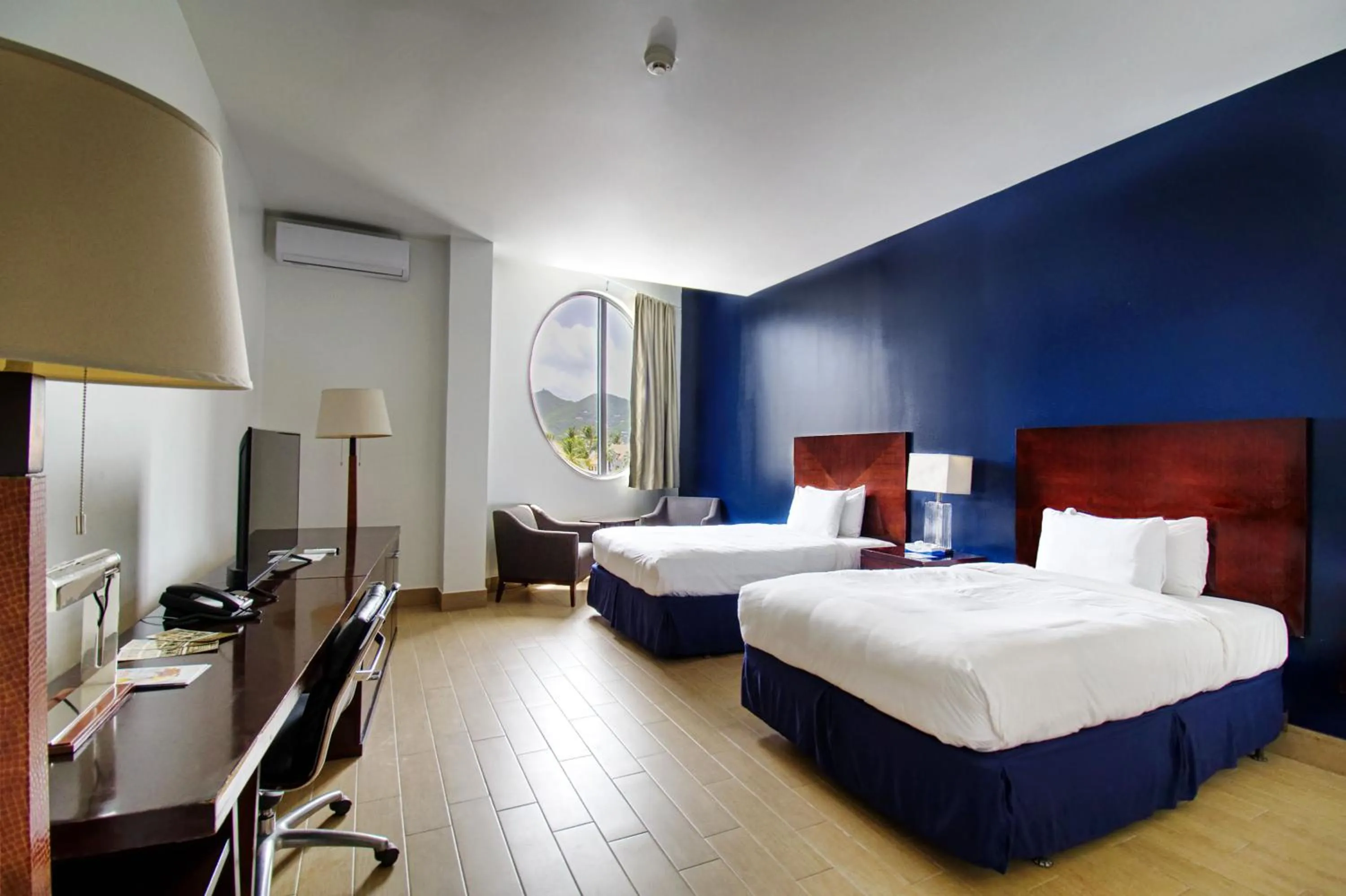 Bed in Commodore Suites