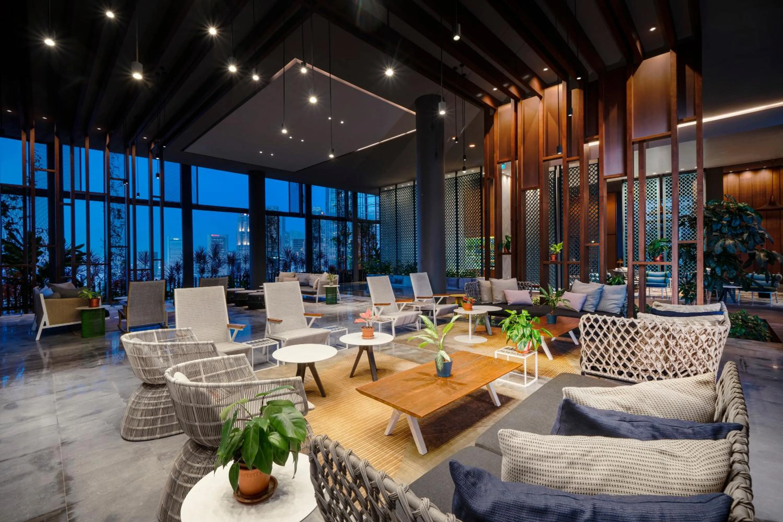 Seating area in Oasia Hotel Downtown, Singapore by Far East Hospitality