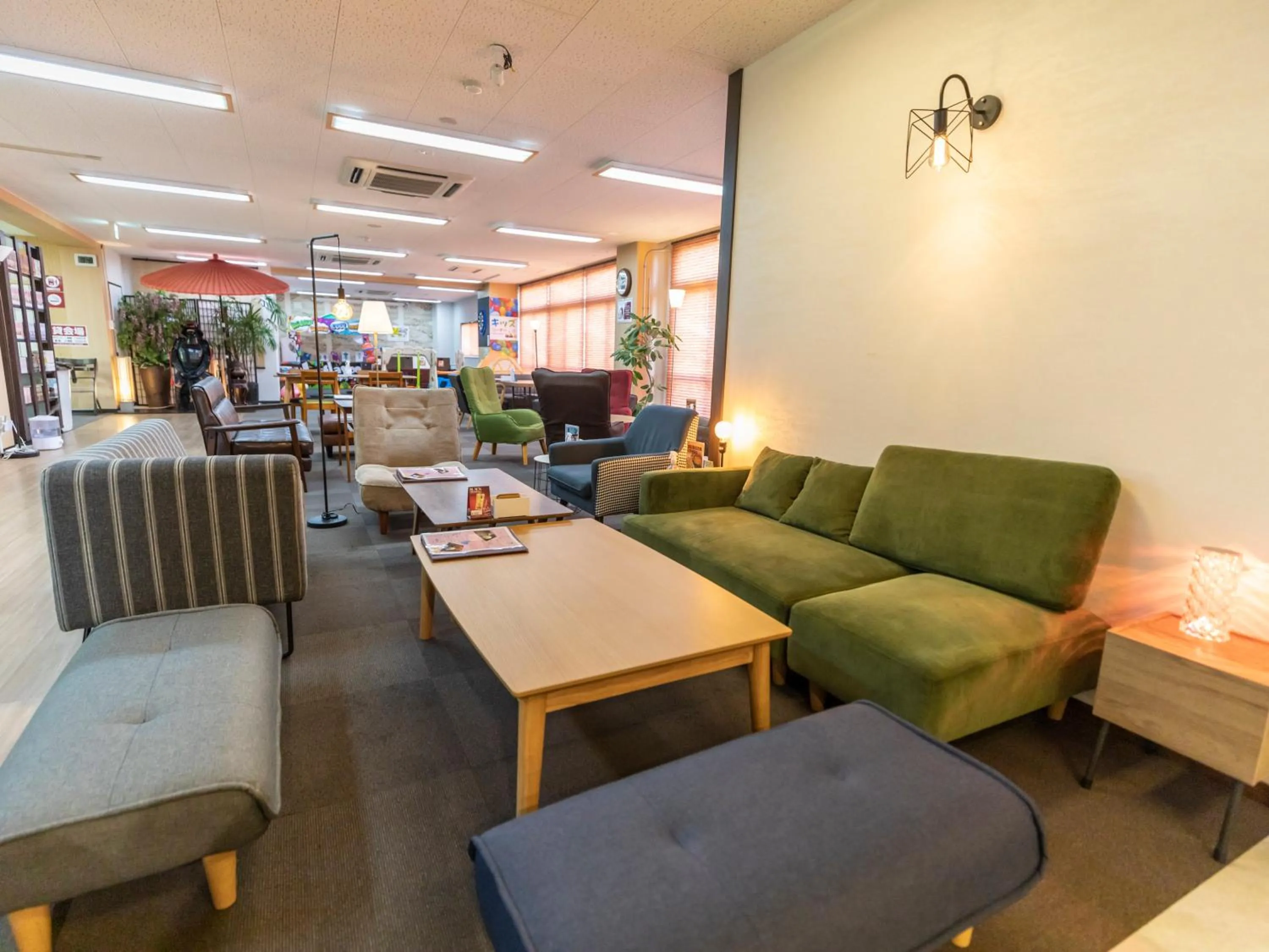 Communal lounge/ TV room in Omotenashi Hostel Miyajima