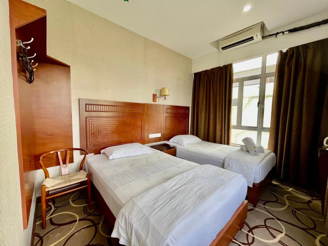 Bed in Fan Holiday Hotel