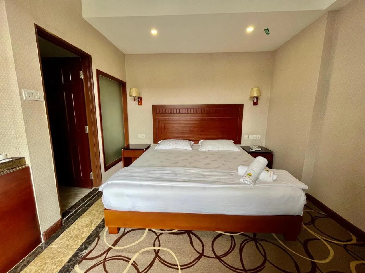 Bed in Fan Holiday Hotel