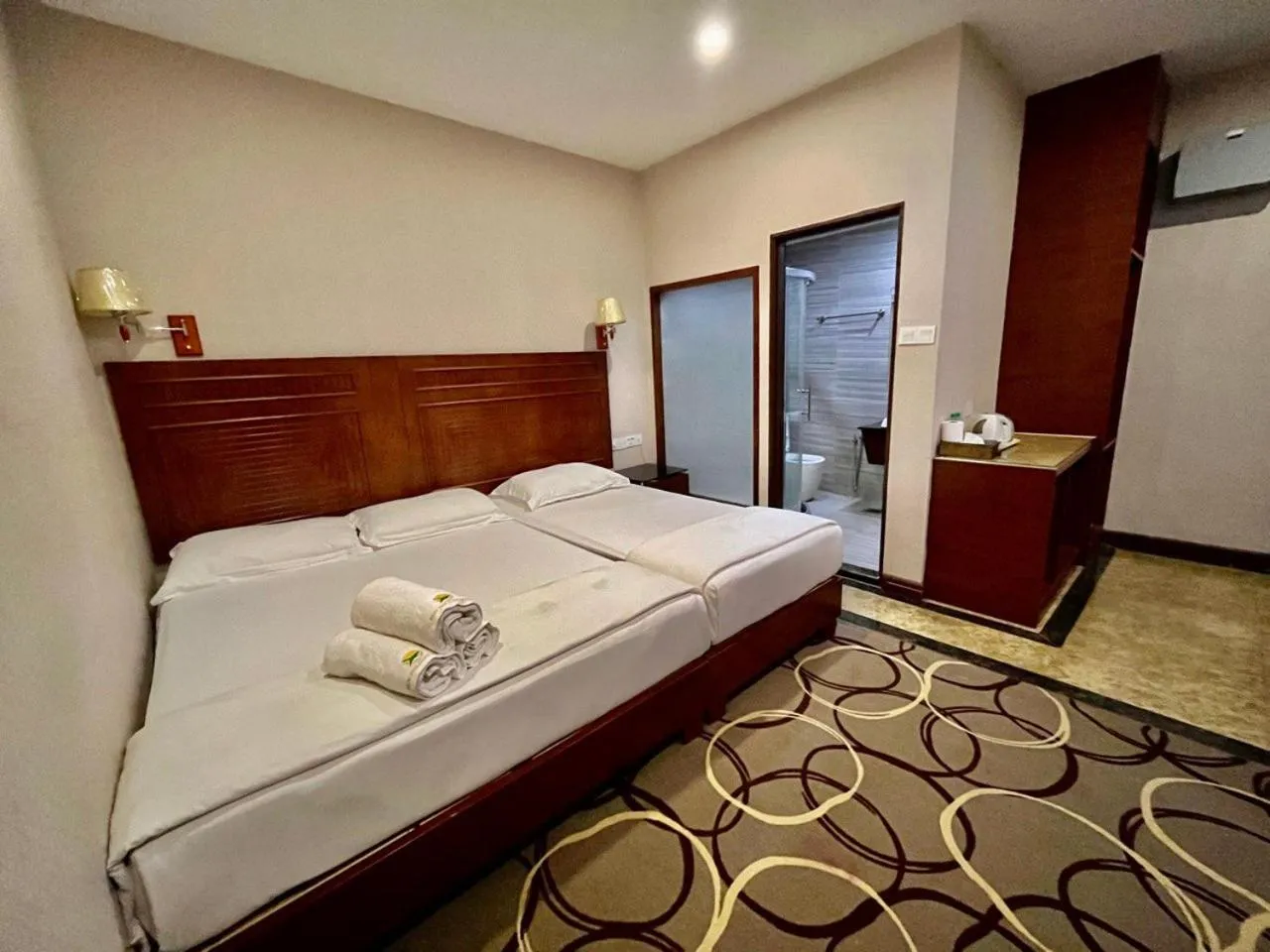 Bed in Fan Holiday Hotel