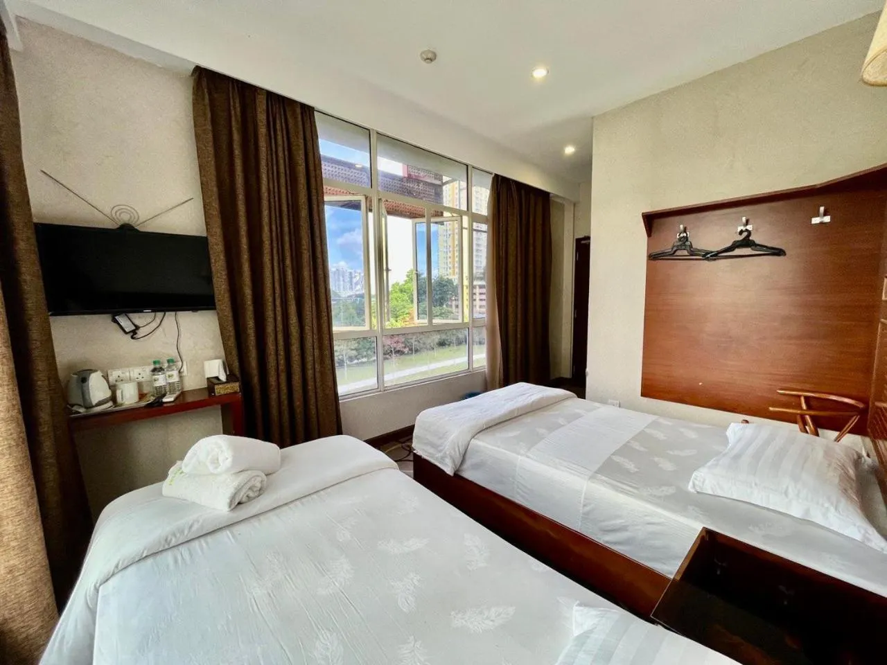 Bed in Fan Holiday Hotel