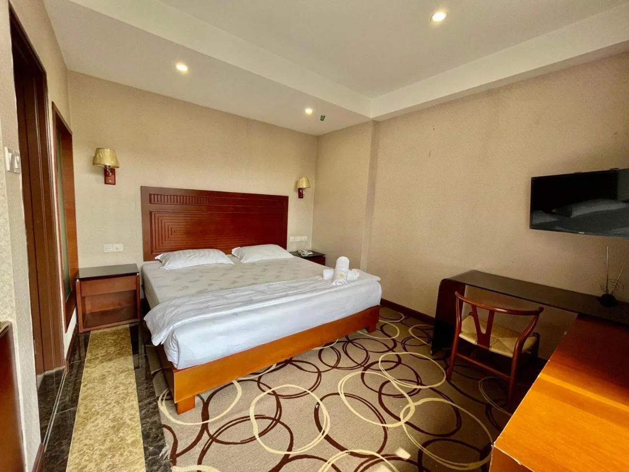 Bed in Fan Holiday Hotel