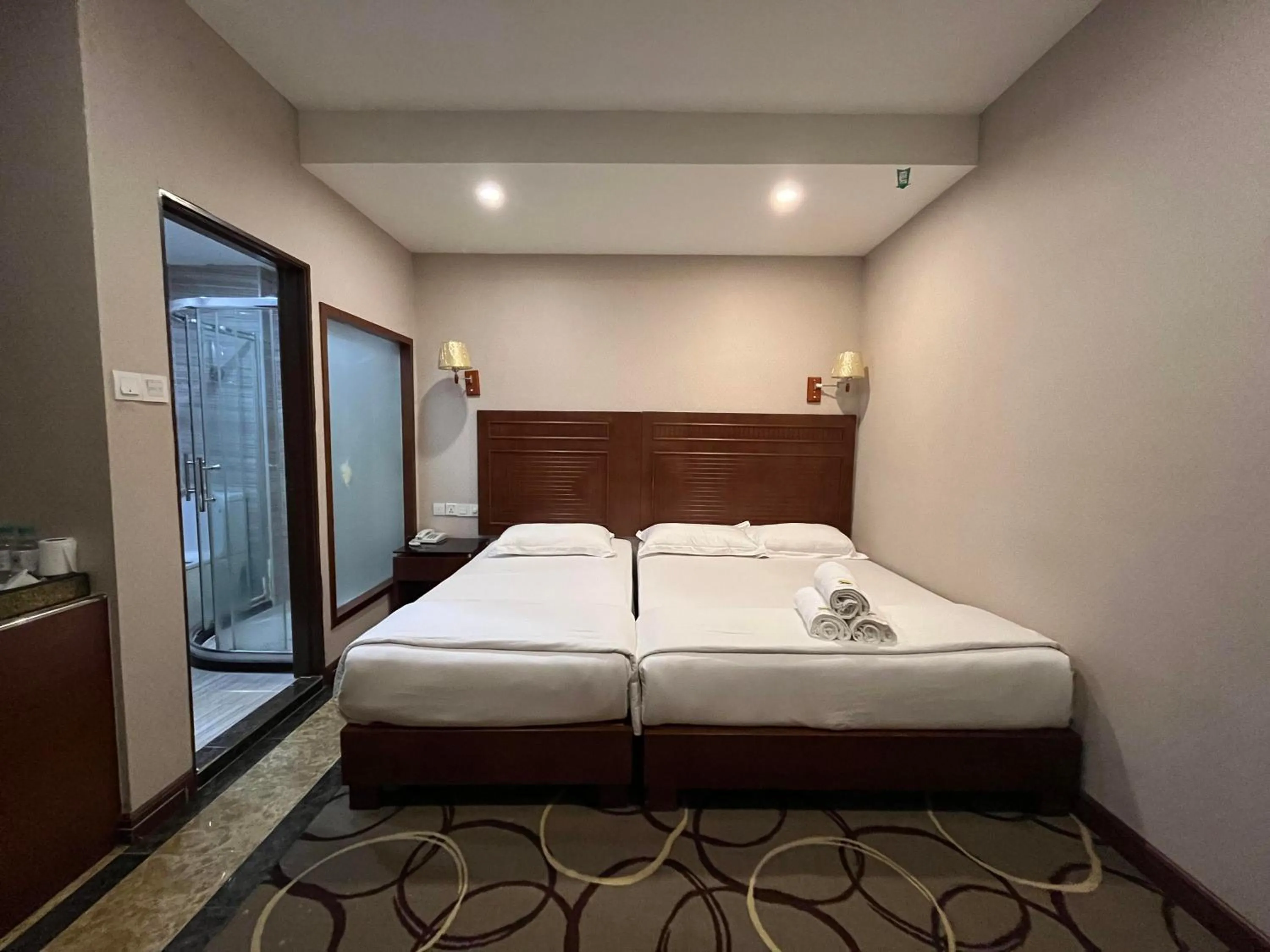 Bed in Fan Holiday Hotel