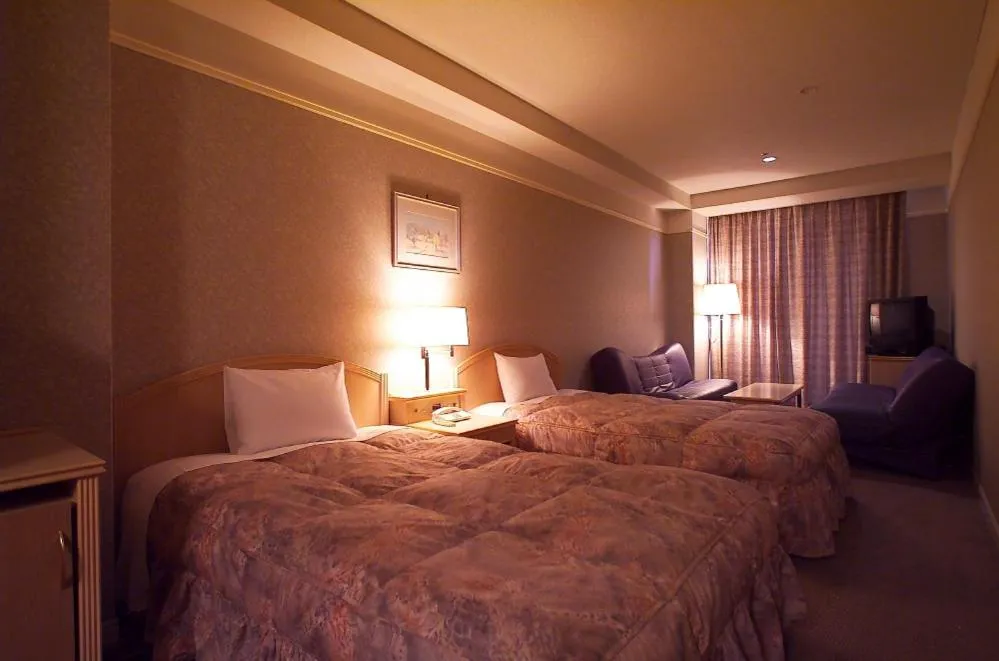 Shower, Bed in Hotel Sekia