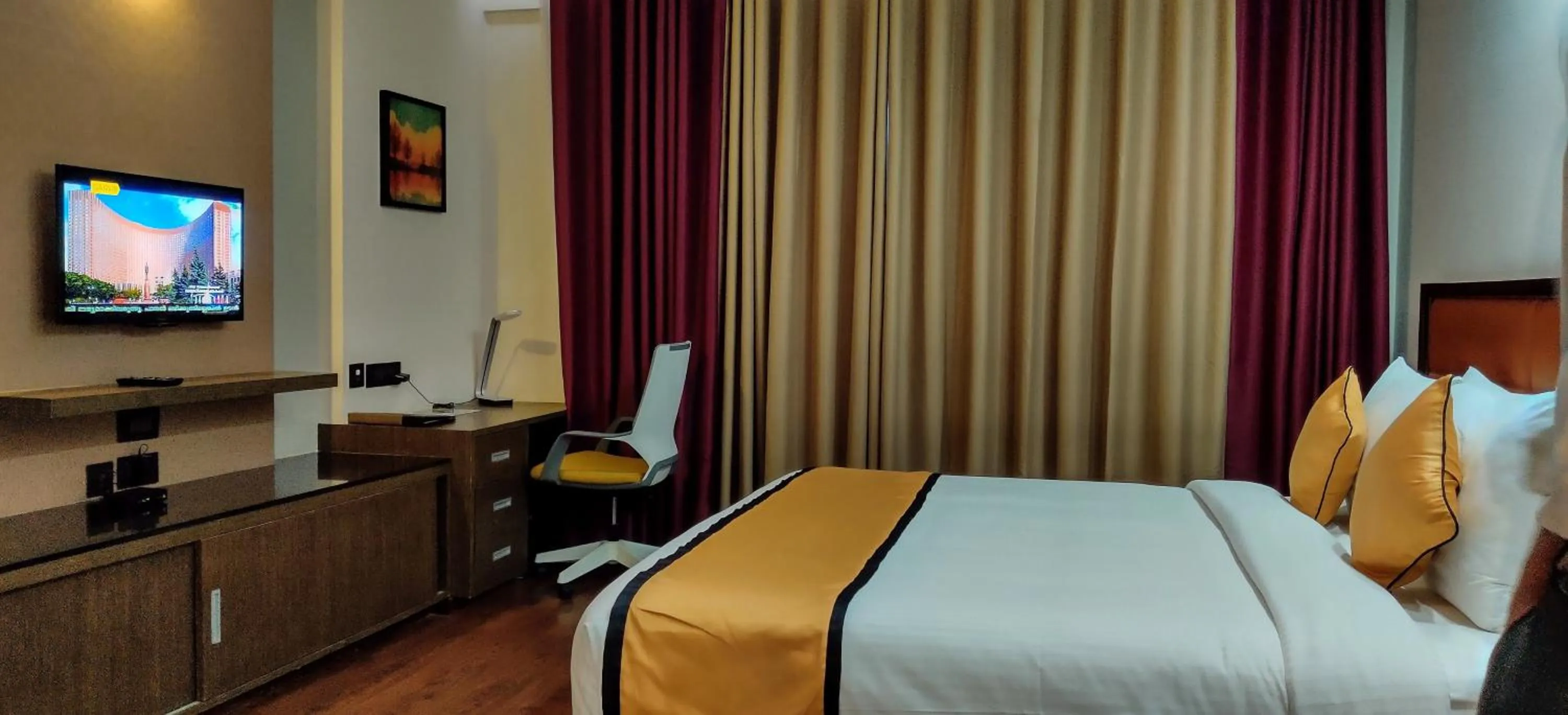 Bed in Dimora Hotel Thiruvananthapuram