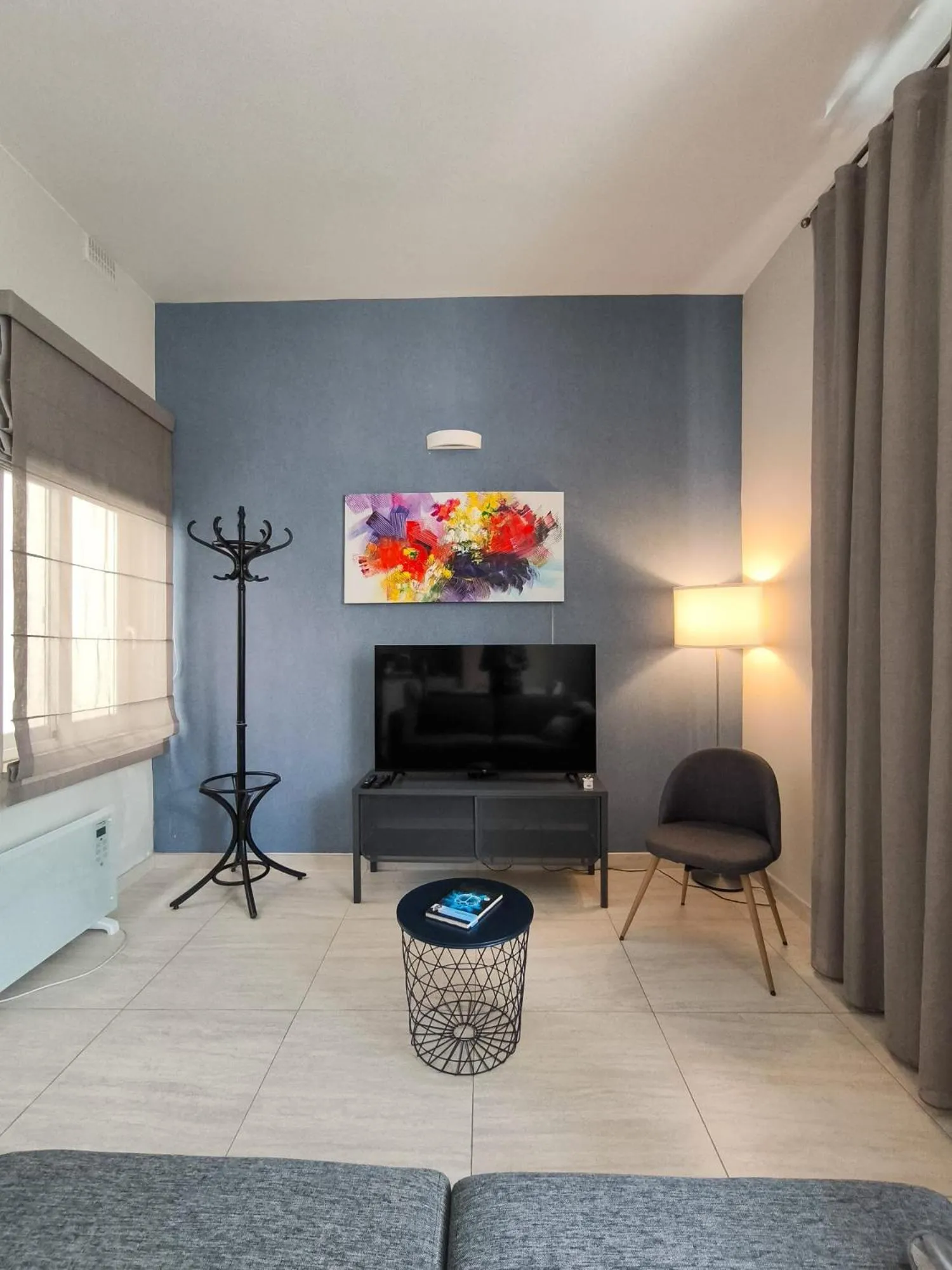 TV and multimedia in D Townhouse Boutique Suites