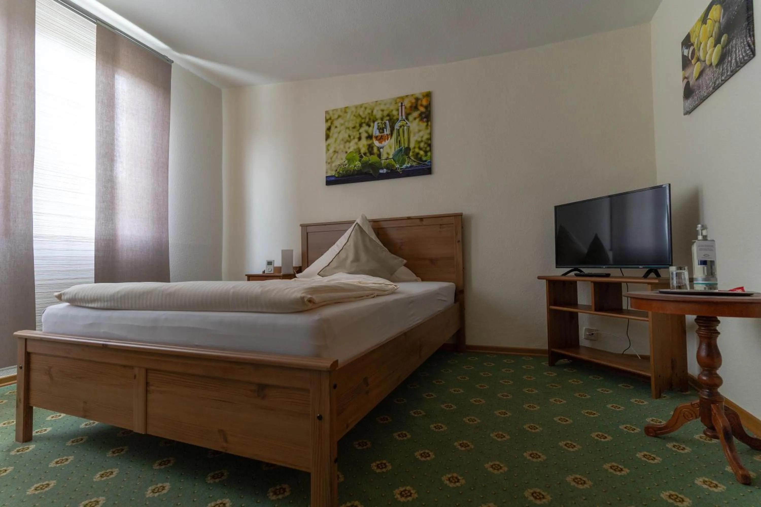Photo of the whole room, Bed in Weingut Stassen