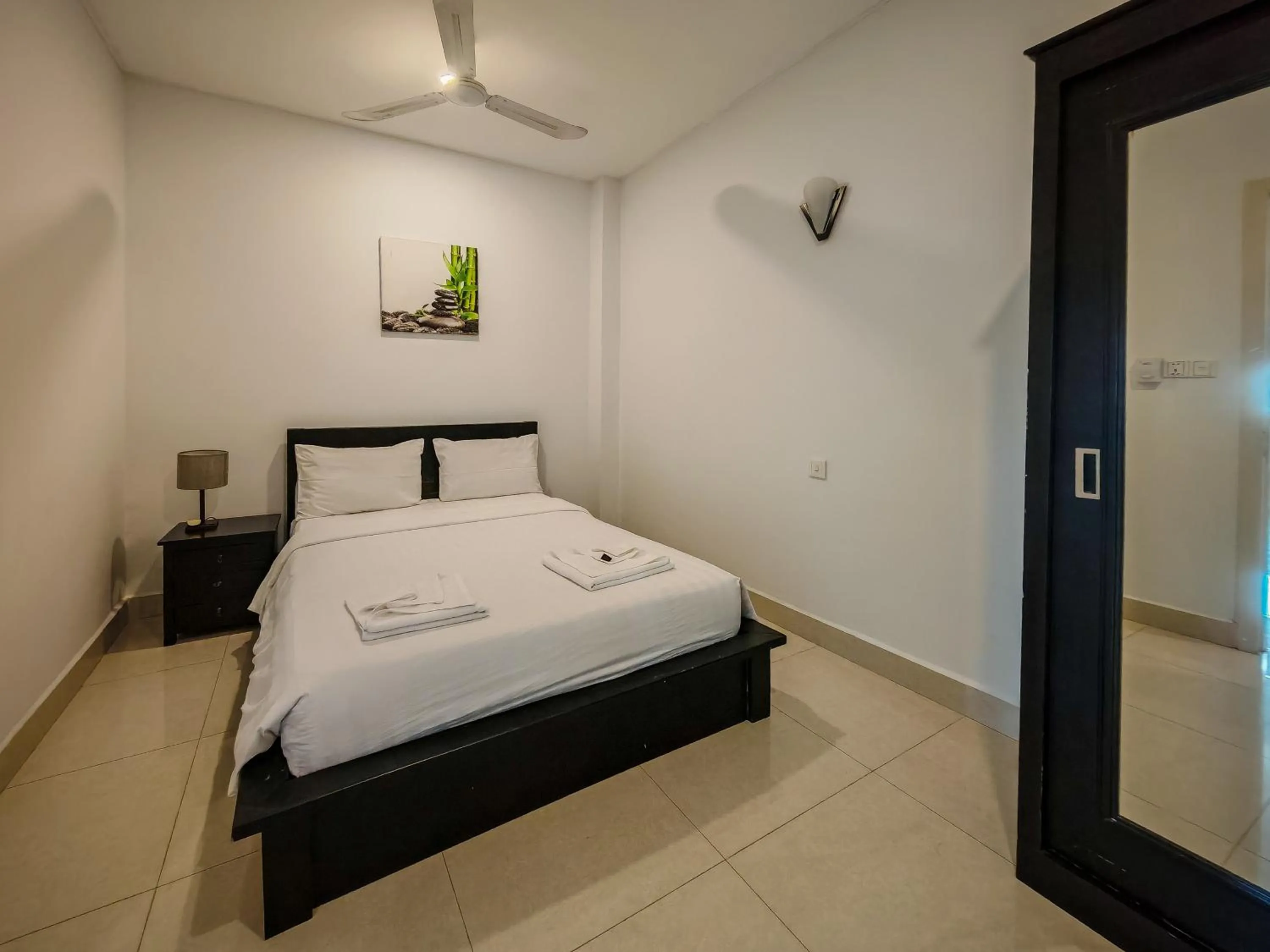 Bed in La Belle Residence