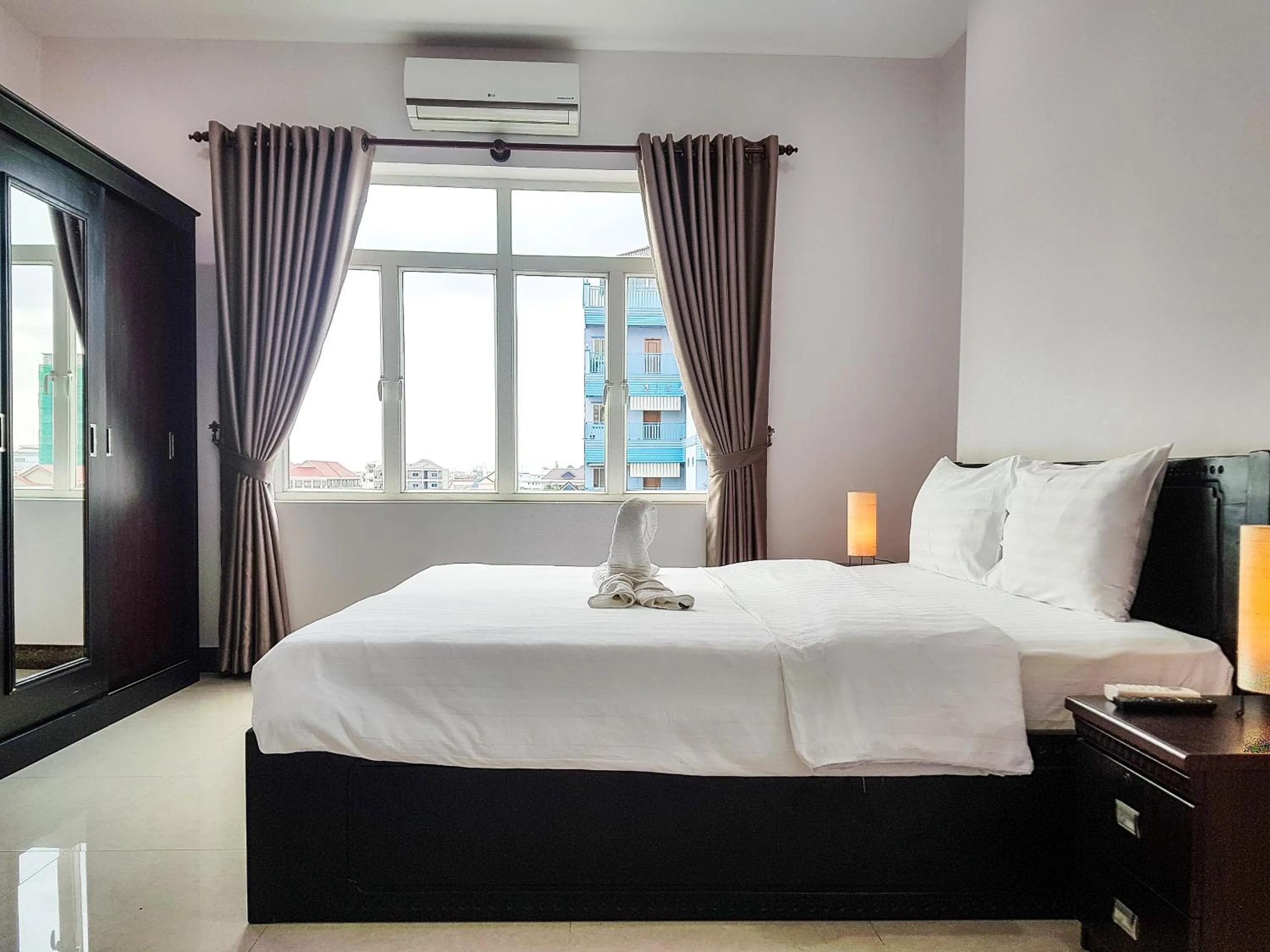 Bed in La Belle Residence