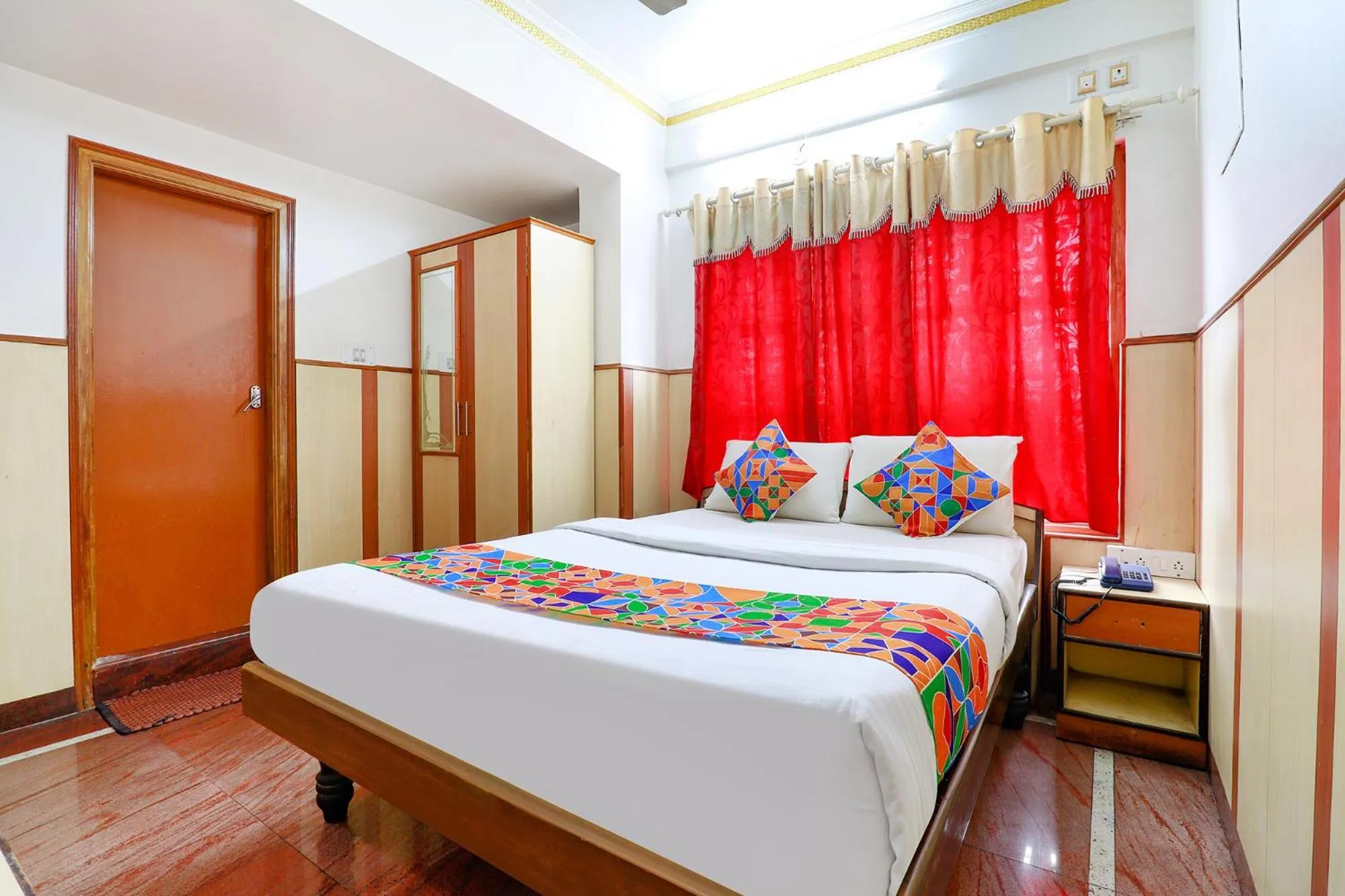 Photo of the whole room in FabHotel Shivaals Residency - Rajajinagar