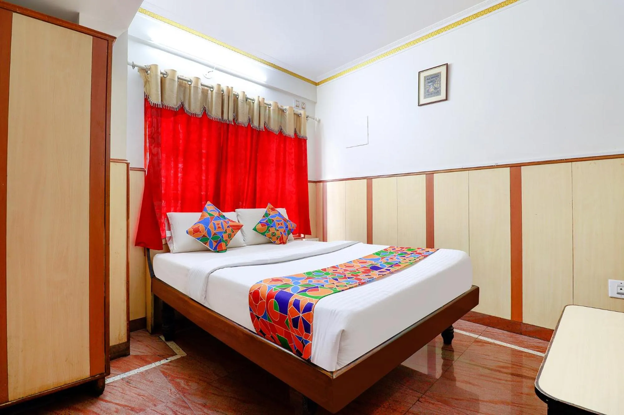 Photo of the whole room in FabHotel Shivaals Residency - Rajajinagar