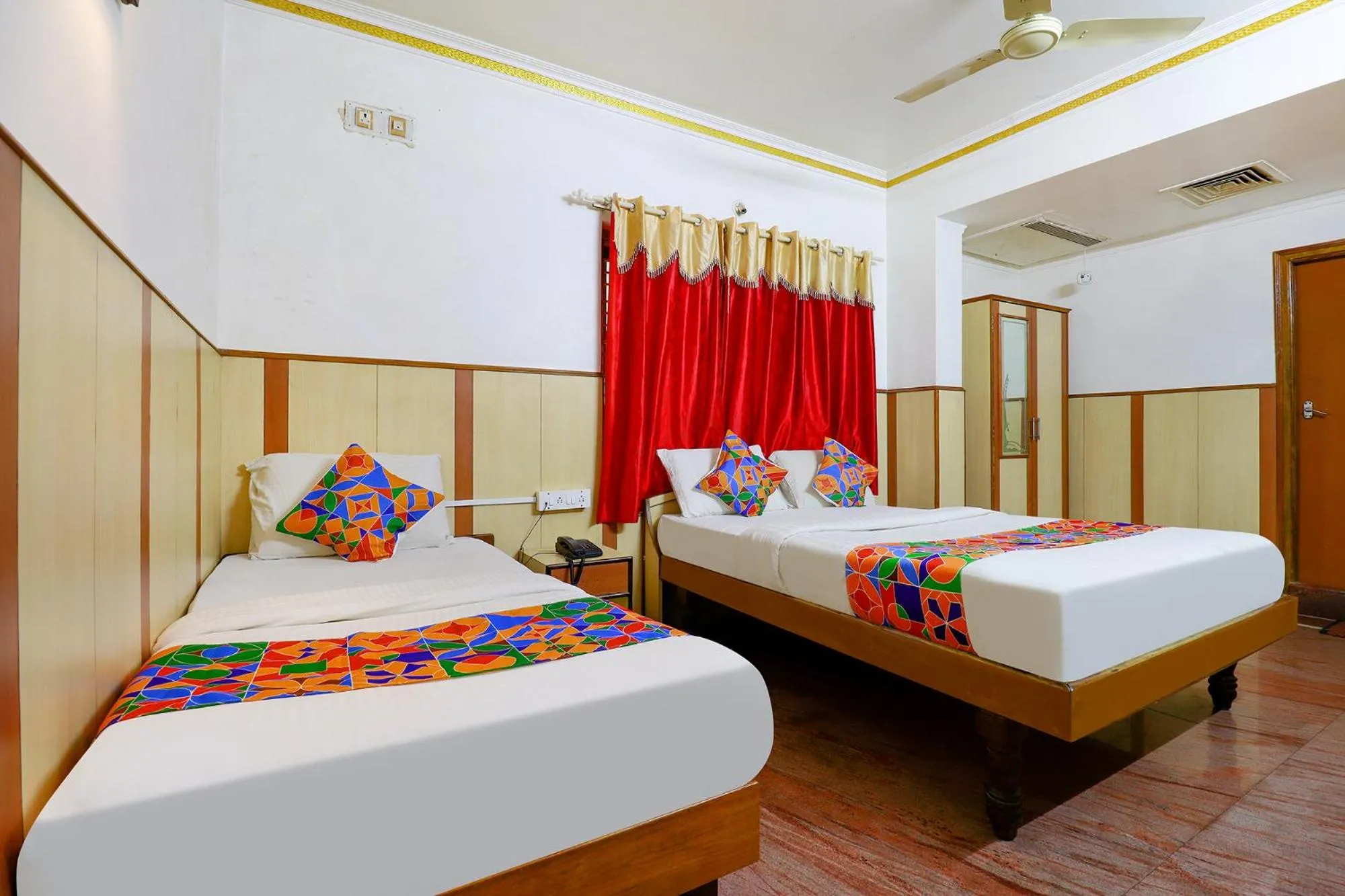 Photo of the whole room in FabHotel Shivaals Residency - Rajajinagar