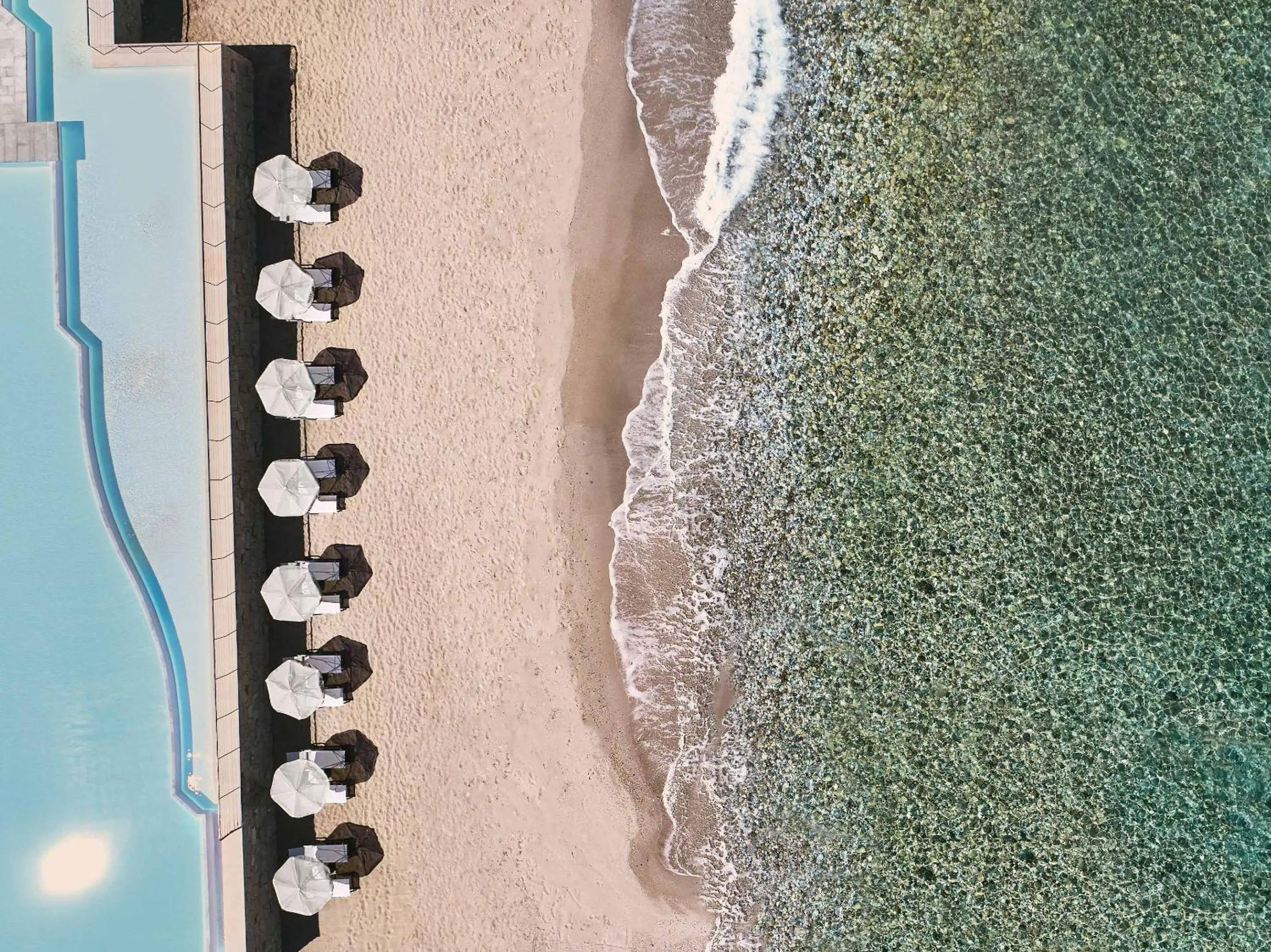 Swimming pool in Grecotel LUXME White