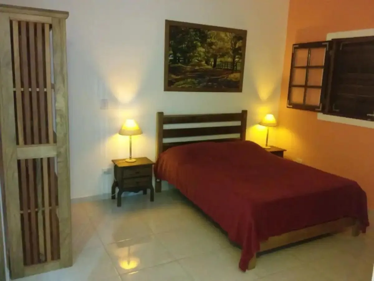 Photo of the whole room, Bed in Chalés Azuleto - Ilhabela