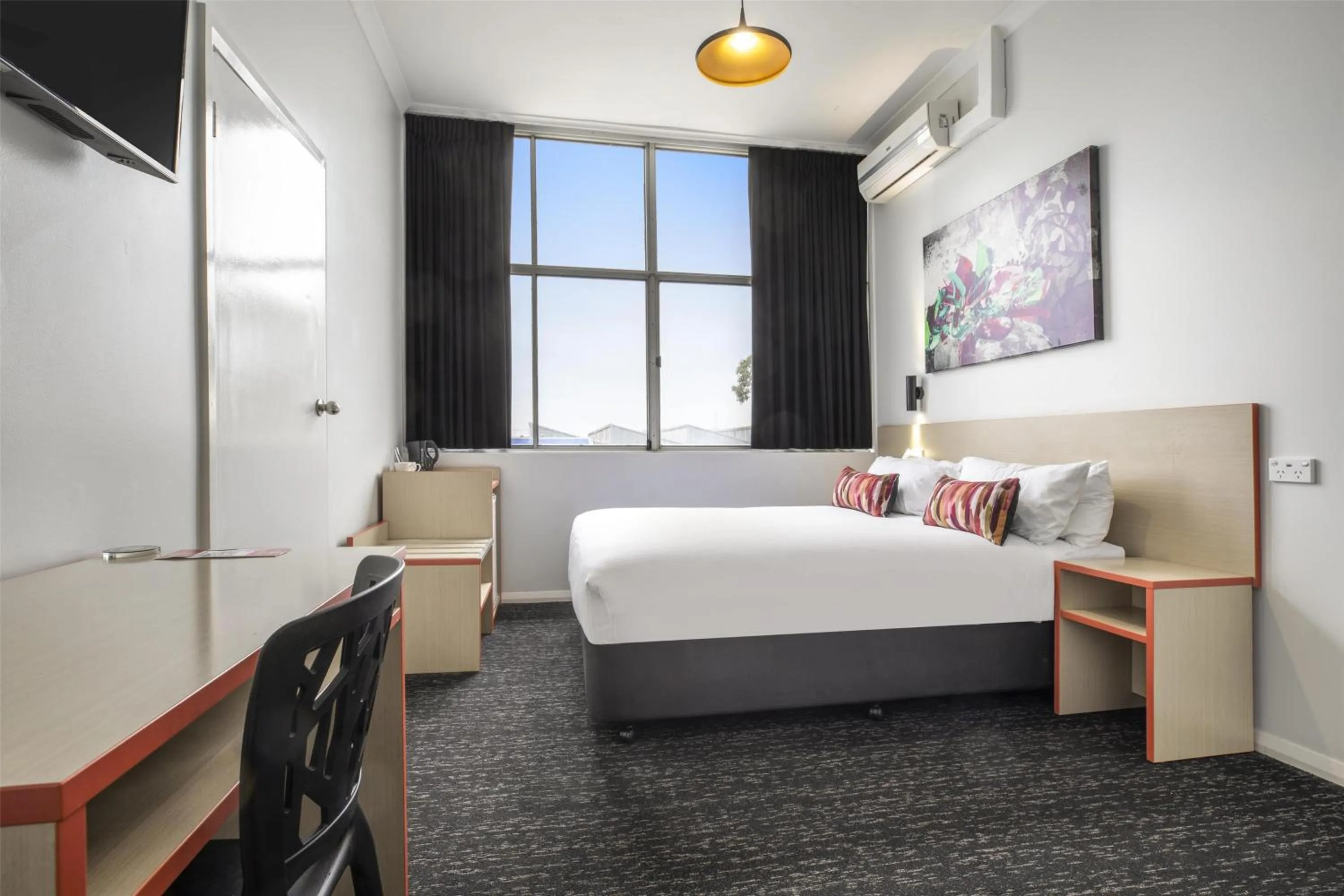 Bedroom, Bed in Nightcap at Ashley Hotel