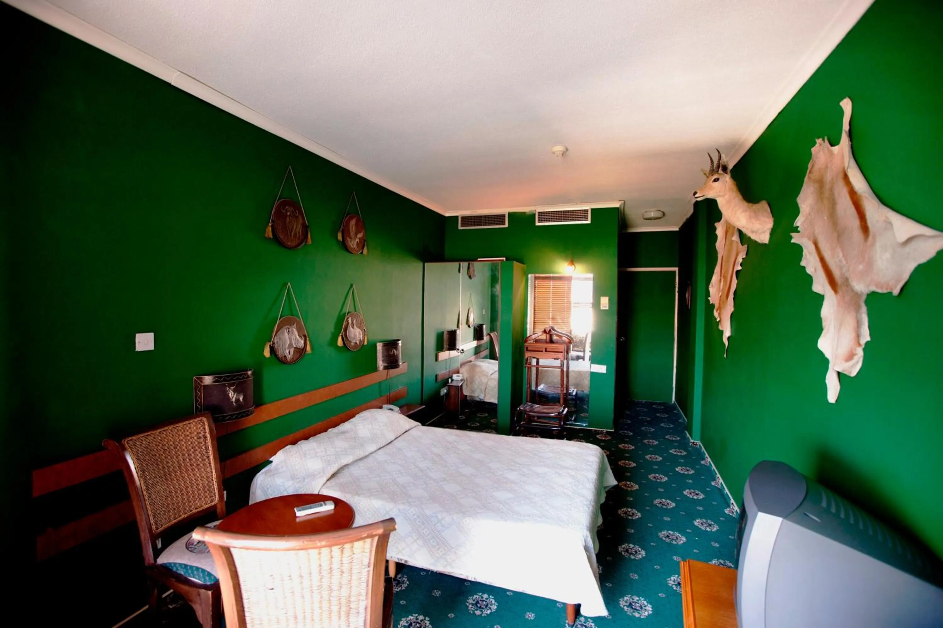 Photo of the whole room, Bed in Sylva Hotel