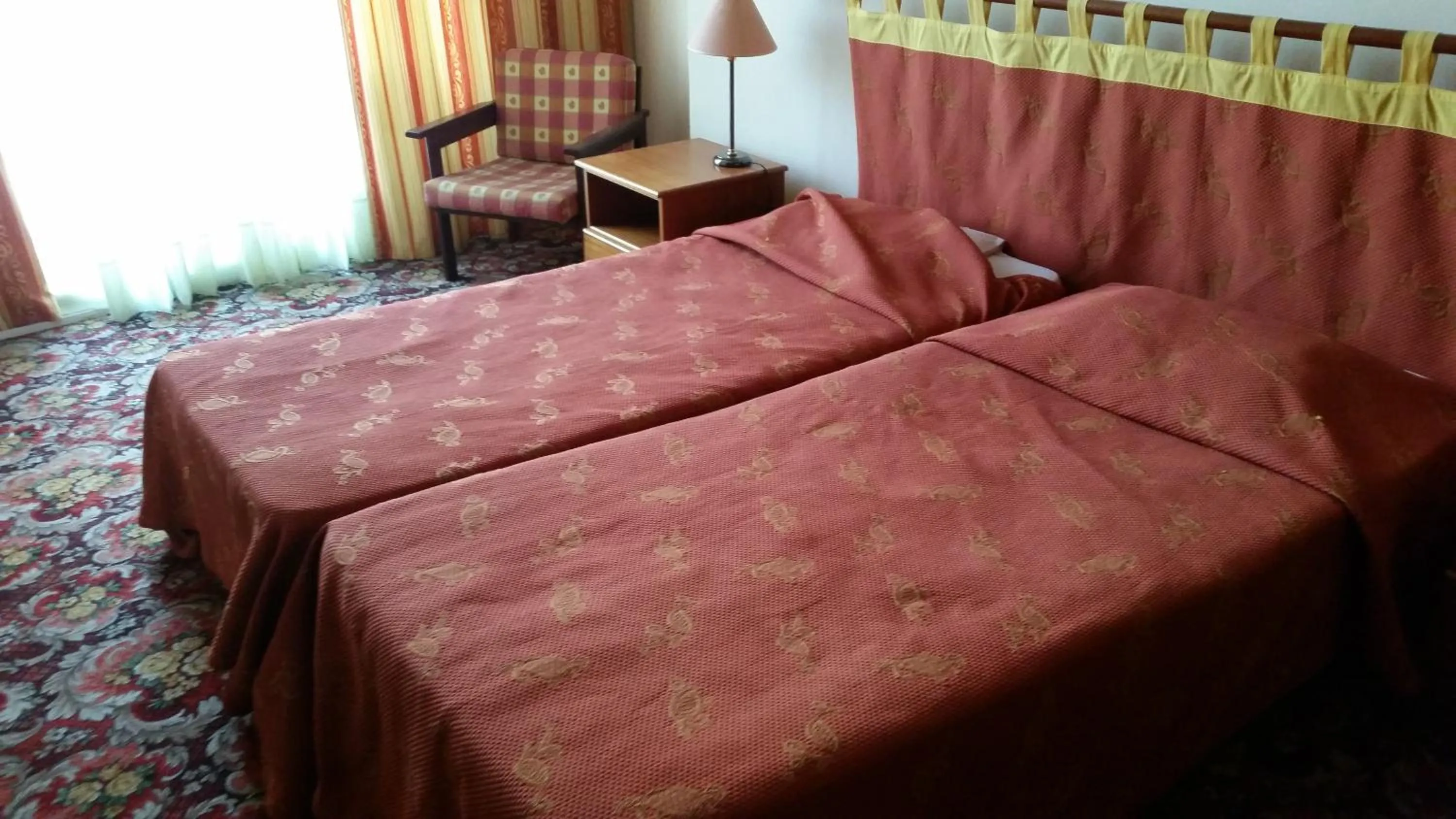 Bed in Sylva Hotel