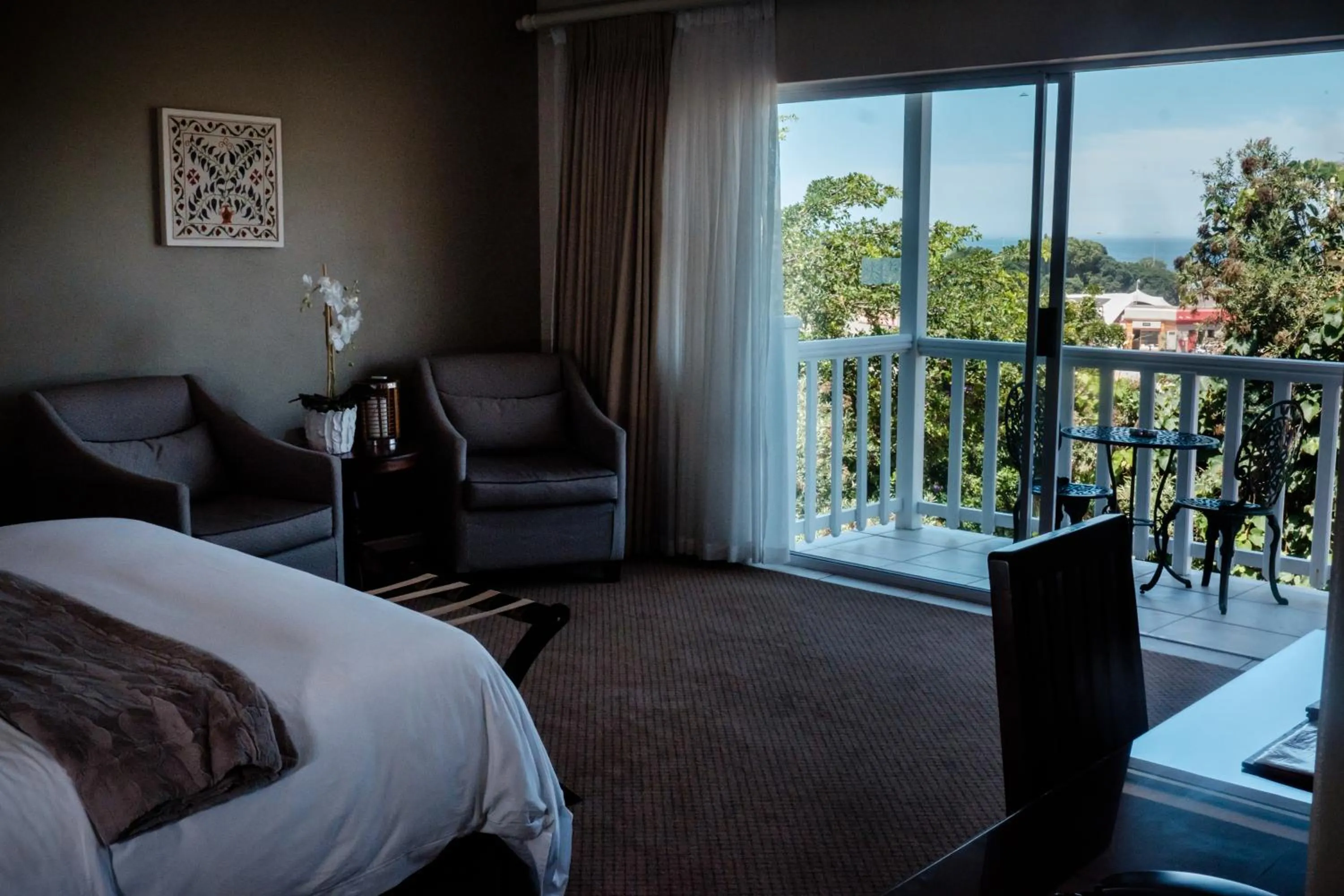 Balcony/Terrace, Bed in Cinnamon Boutique Guest House