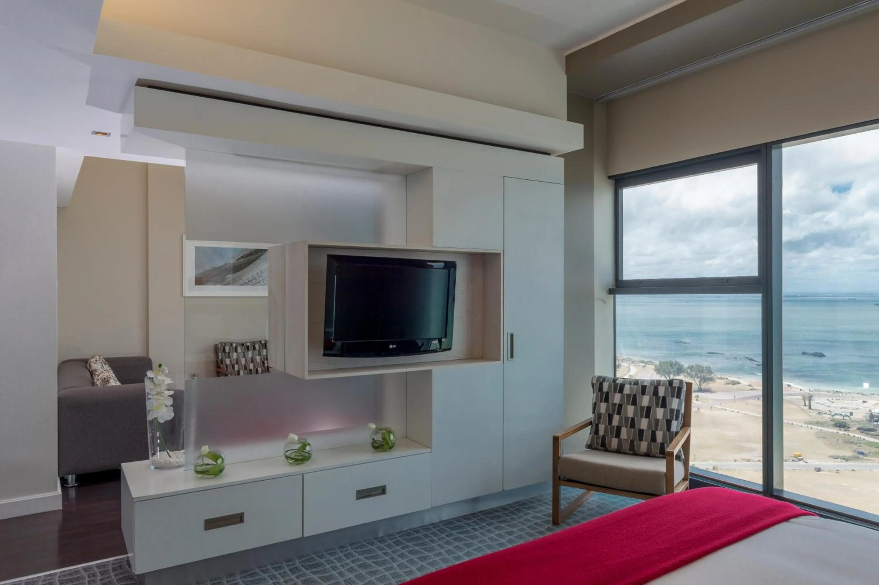 Living room, Bed in Radisson Blu Hotel, Port Elizabeth