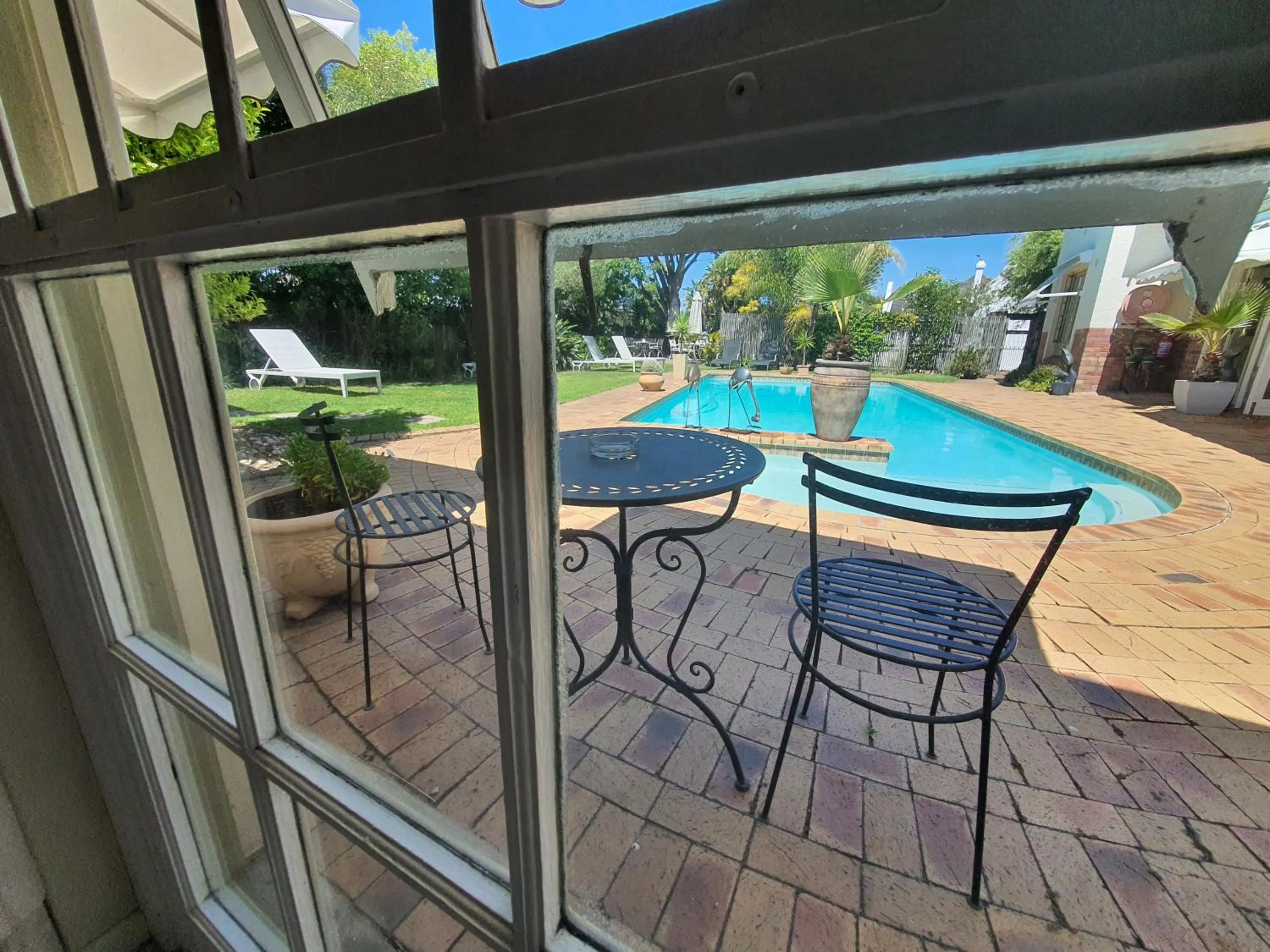 Swimming pool in Wild Olive Guest House & Villa