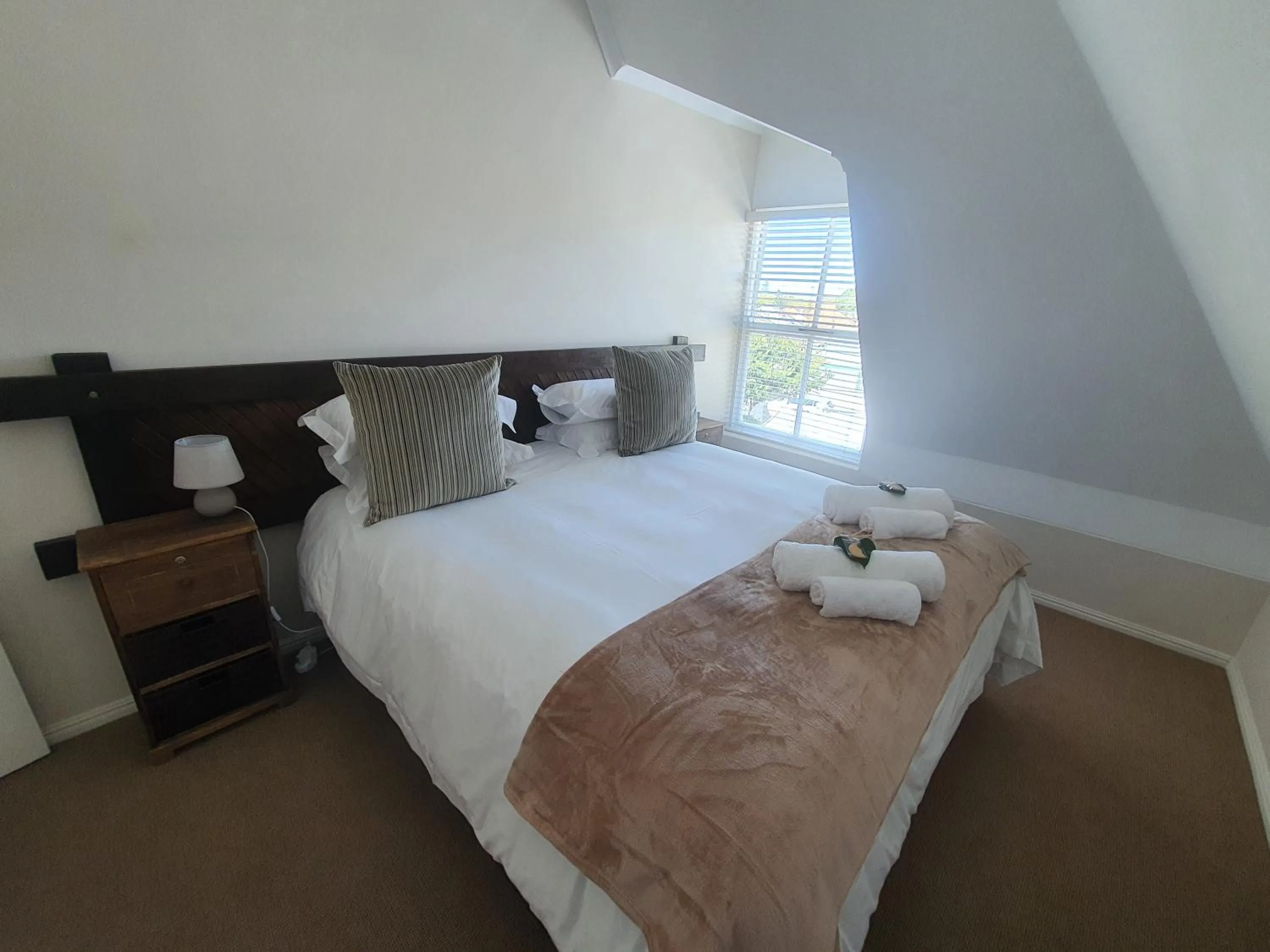 Bed in Wild Olive Guest House & Villa