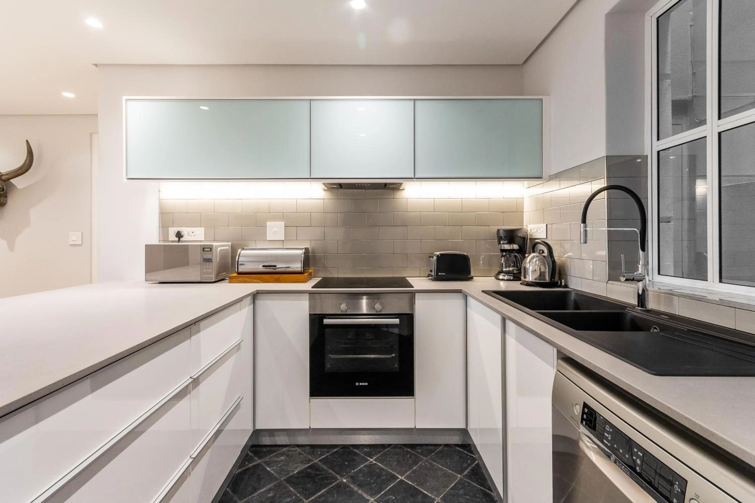 Kitchen or kitchenette in Romney Park Luxury Apartments by The Stay Collection