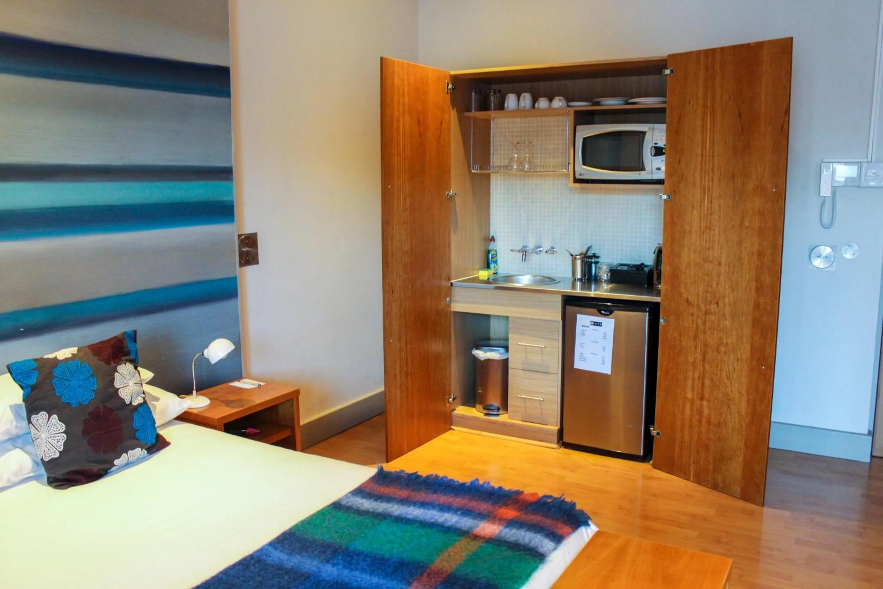 Kitchen or kitchenette, Bed in Hippo Boutique Hotel