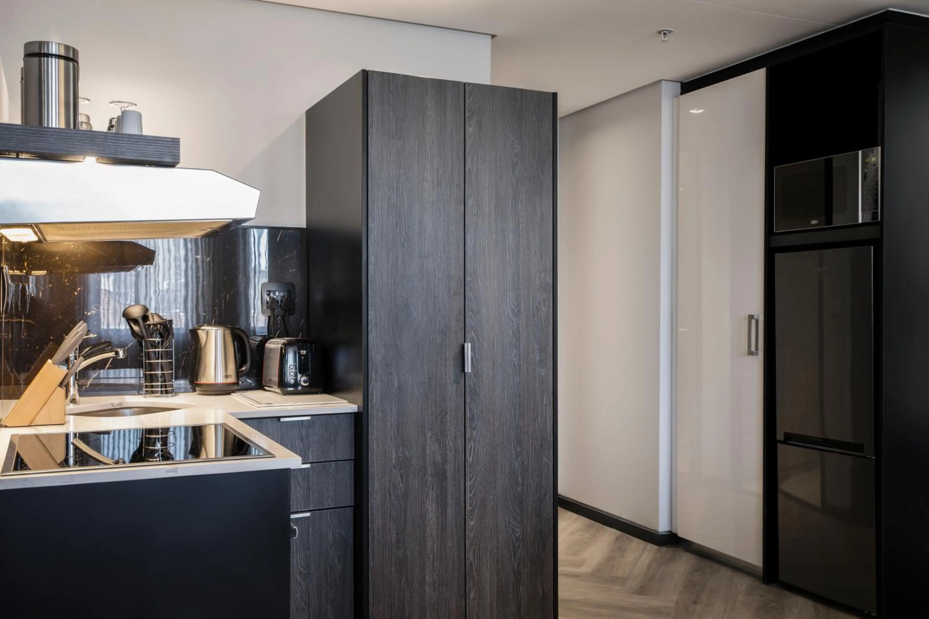 Kitchen or kitchenette in The Capital 15 on Orange Hotel & Spa