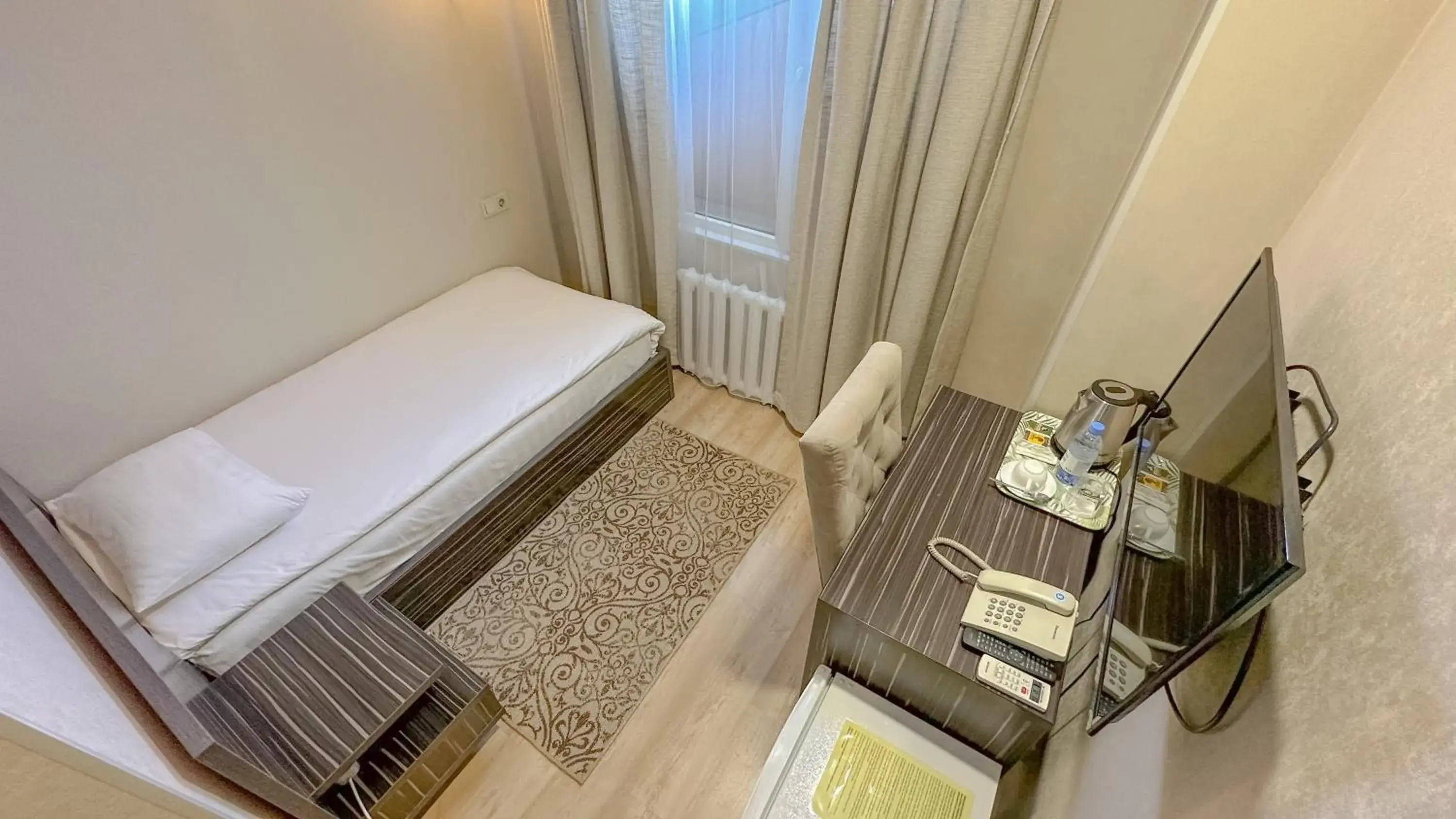 Single Room without Window - single occupancy in Resident Hotel Almaty Single Room without Window - single occupancy in Resident Hotel Almaty